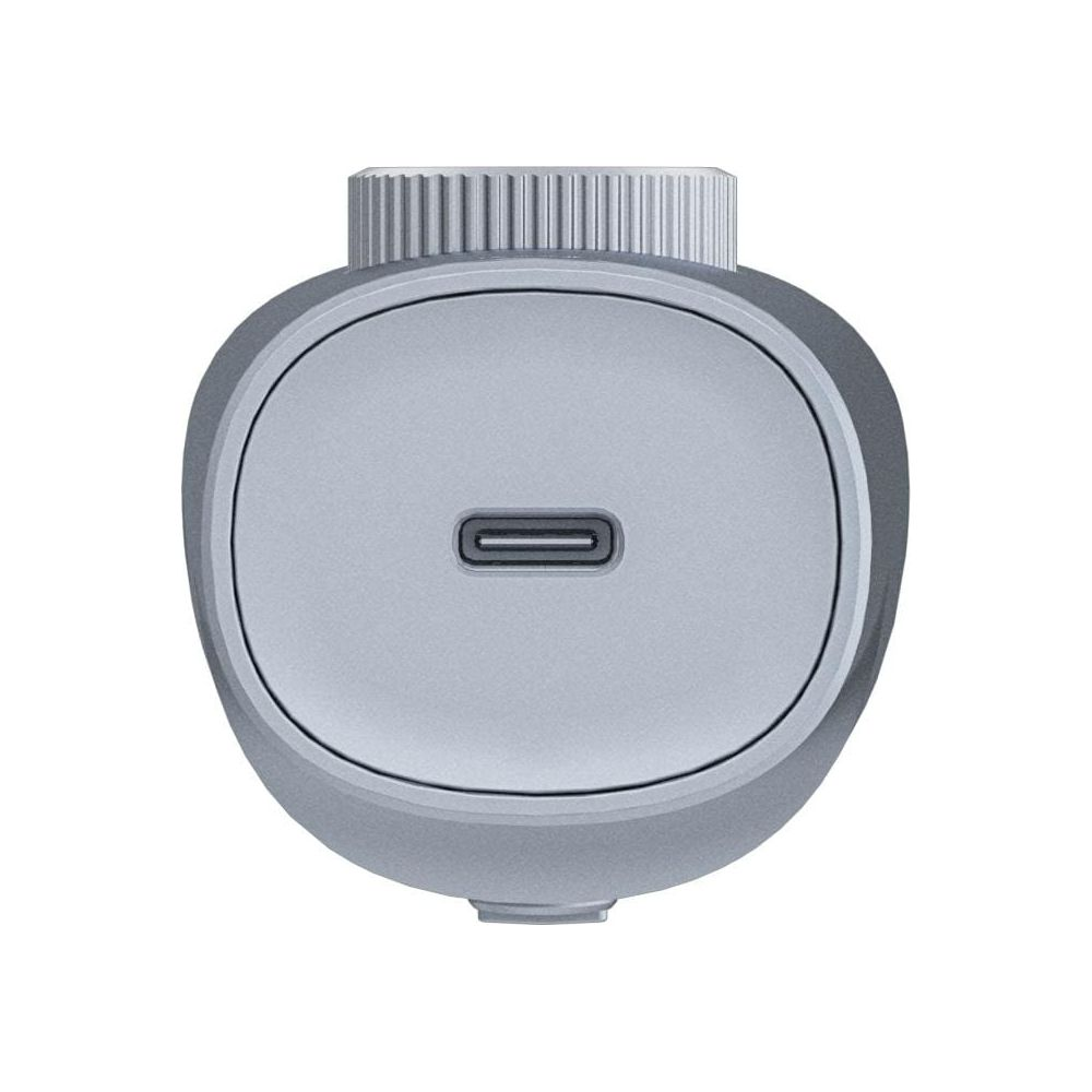 Dispositivo USB-C gris con perilla moleteada arriba y puerto.