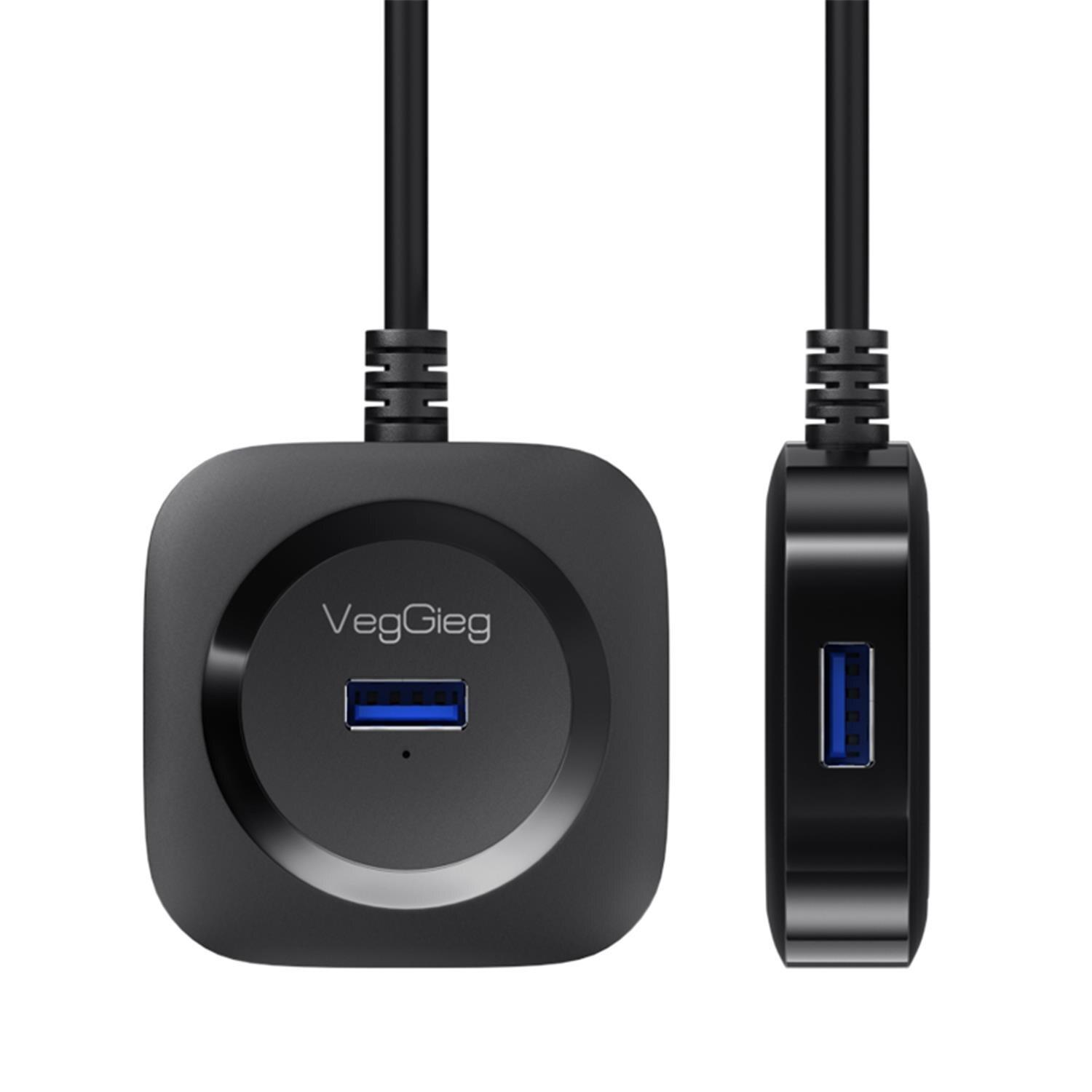 Beyaz arka planda kablolu iki siyah USB hub.