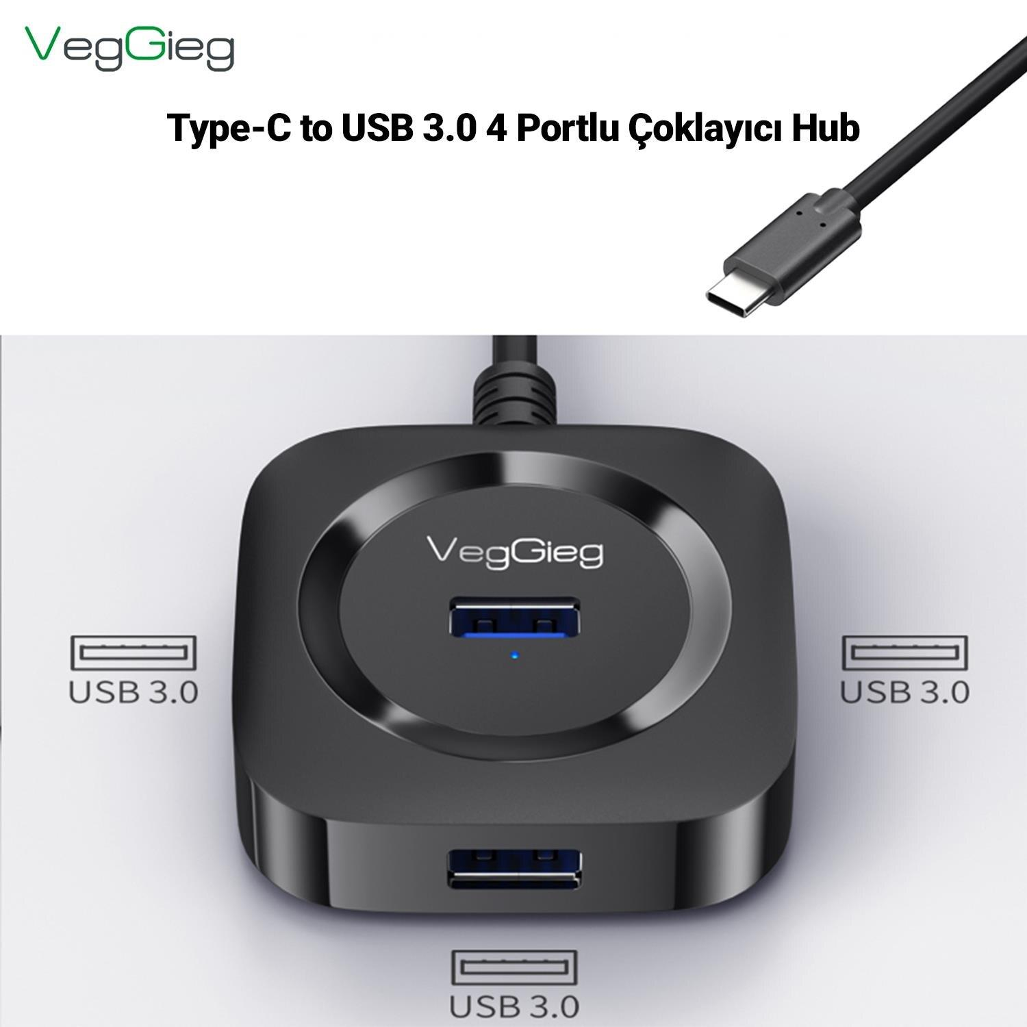Dört USB 3.0 bağlantı noktalı siyah USB-C hub ve Type-C kablosu.