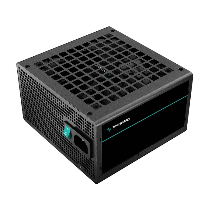 Ein dunkler Computernetzteil mit einem grünen Netzschalter und Lüftungsgitter.