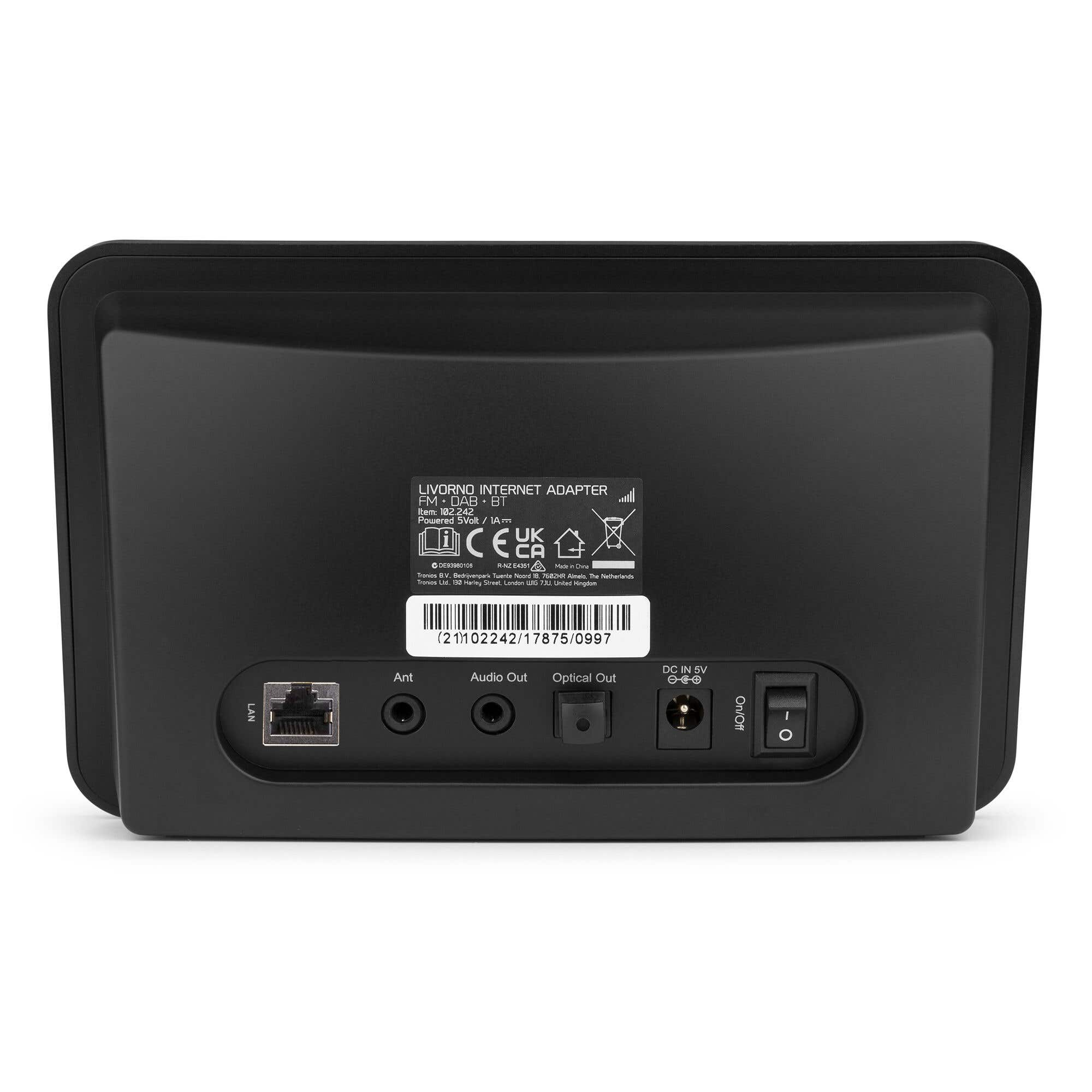 Parte trasera de un dispositivo negro mostrando puertos: LAN, Ant, Salida de Audio, Salida Óptica, DC IN 5V y interruptor On/Off.