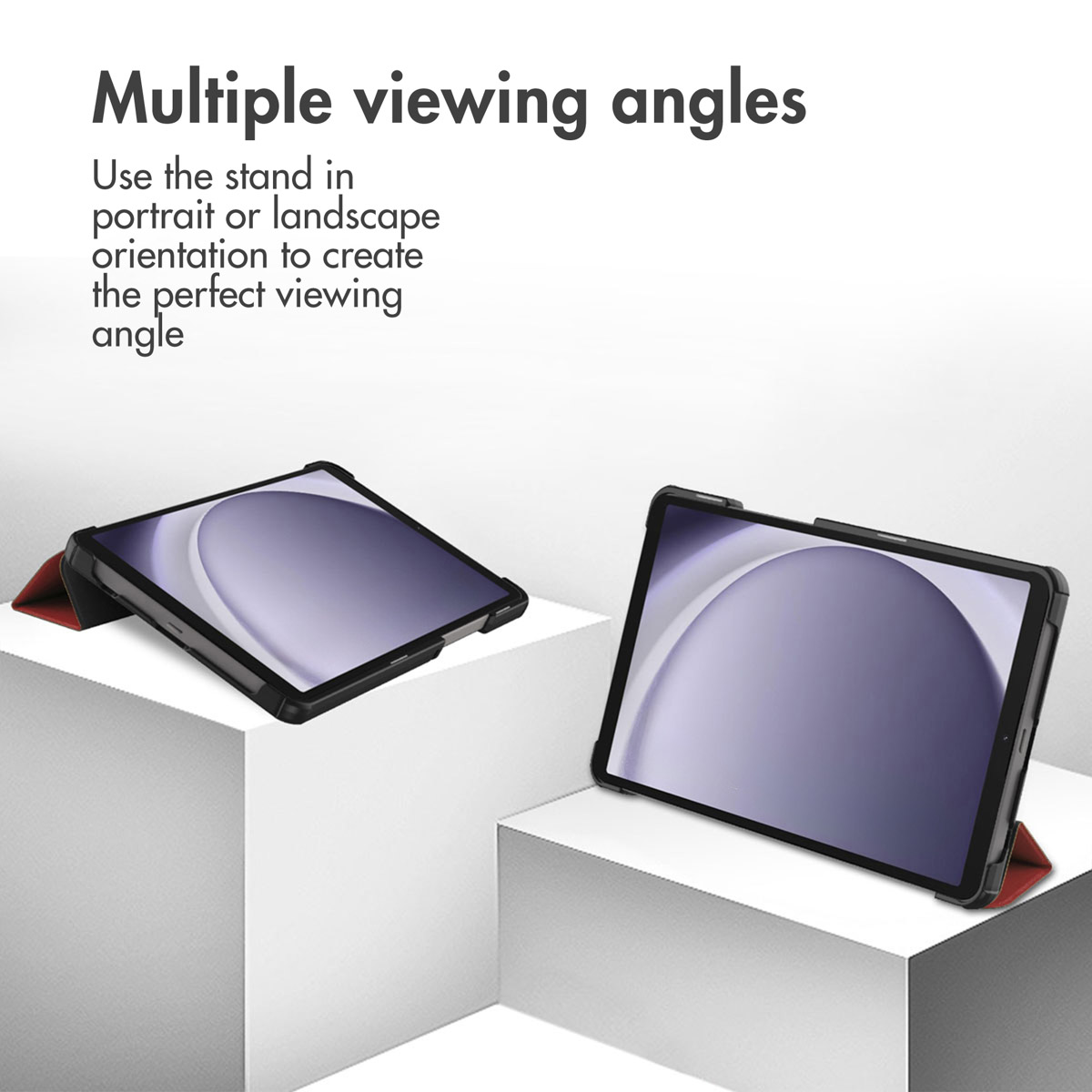 Two tablets in black cases on white pedestals, one in portrait, one in landscape orientation.