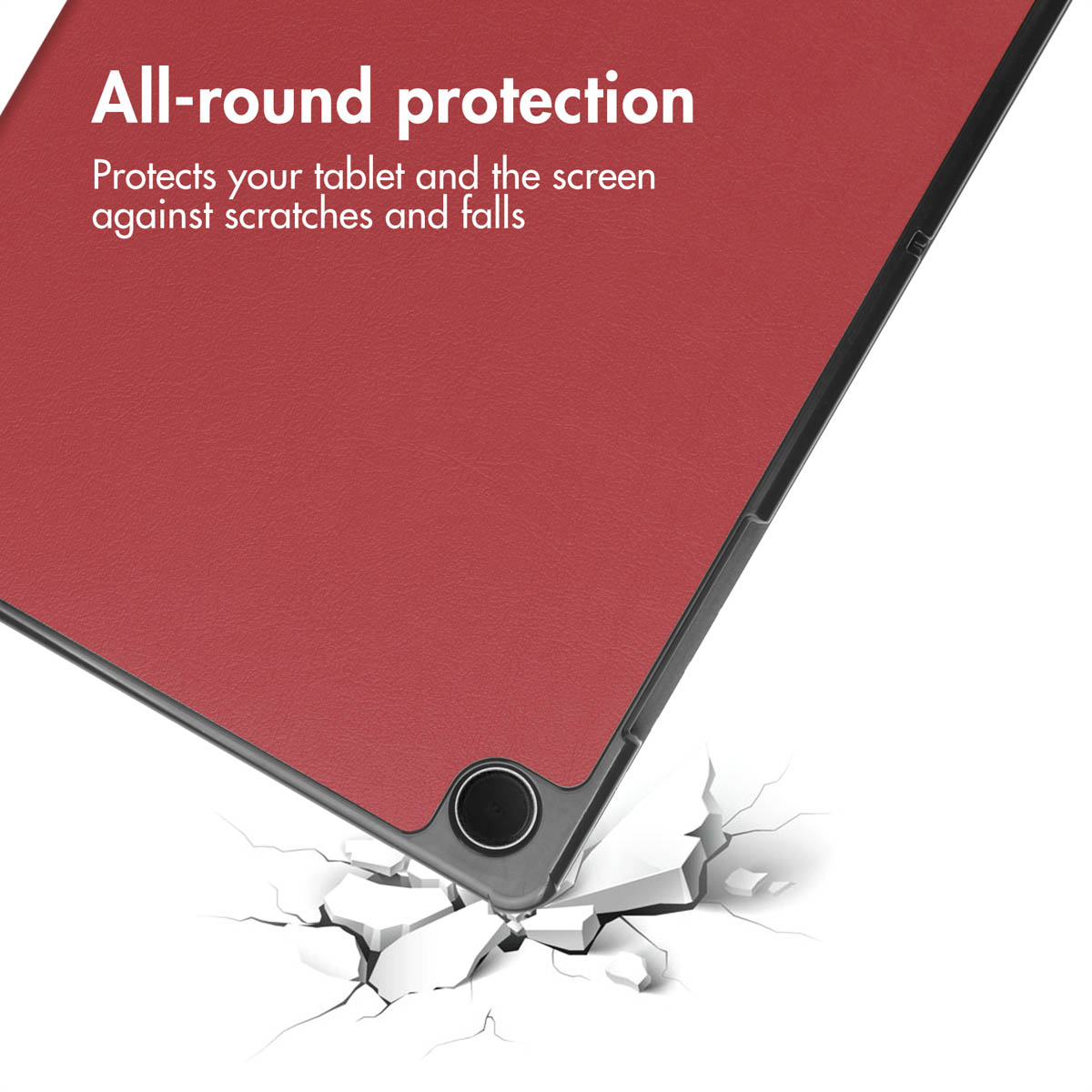 Red tablet case with text, falling onto a cracked surface.