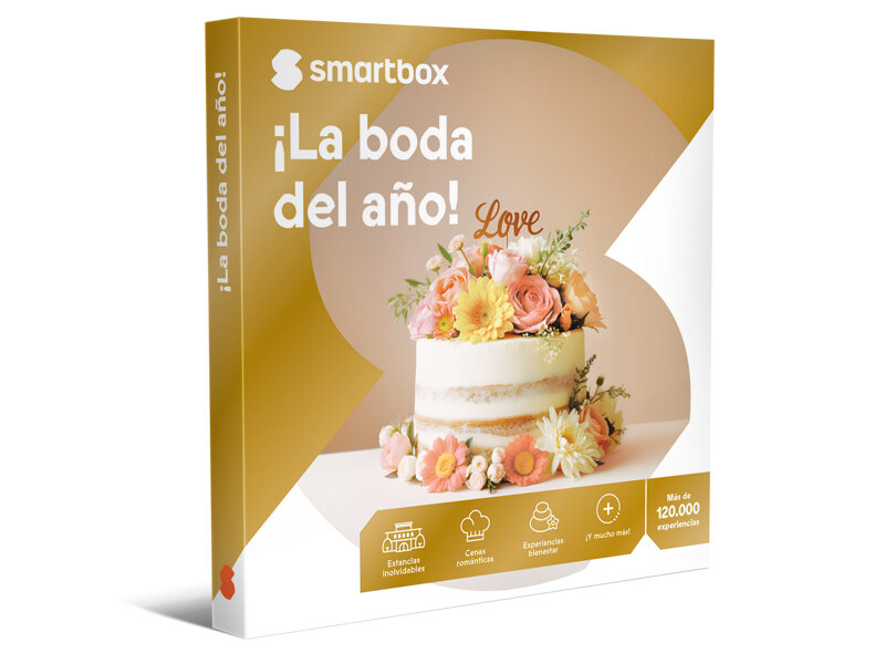 Una caja de regalo Smartbox con un pastel de bodas desnudo decorado con flores.