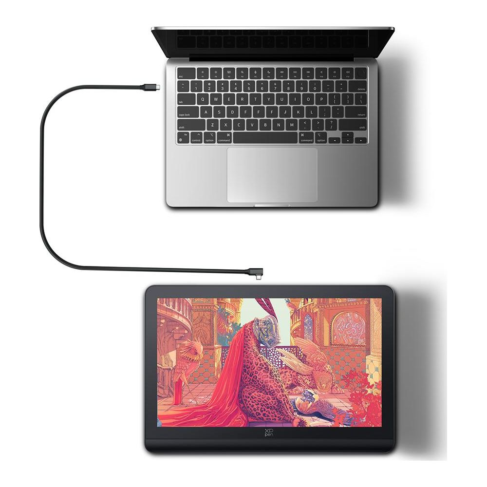 Ein offenes Laptop und ein Grafiktablett sind mit einem Kabel verbunden.