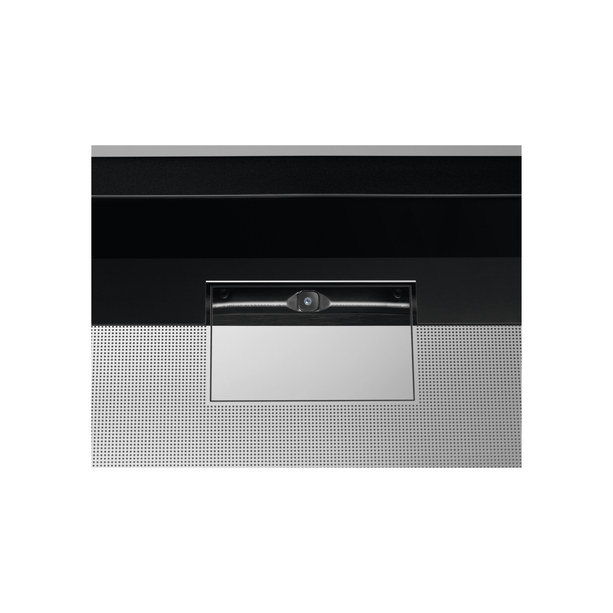 Un dispositivo negro con cámara y panel de control plateado.