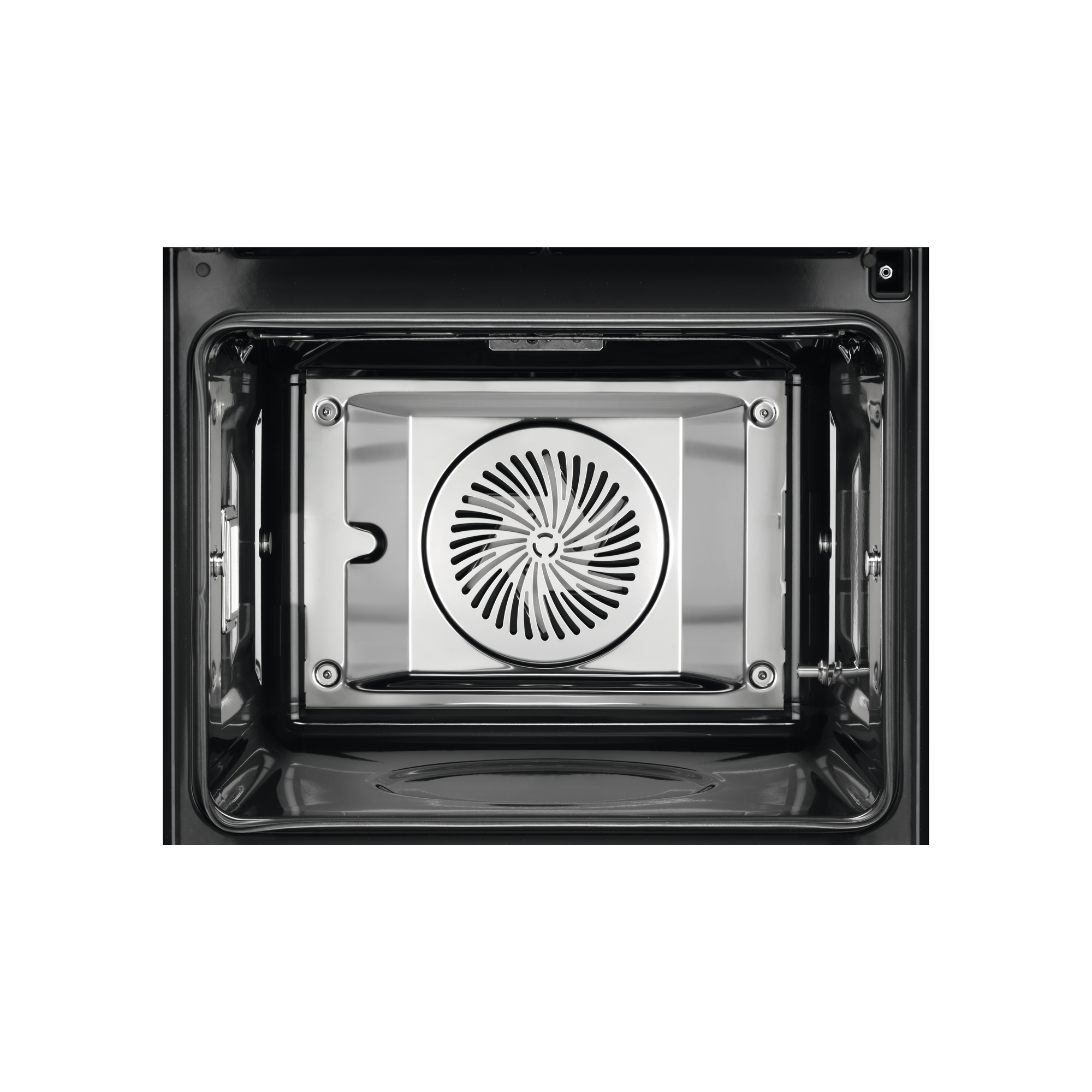 Vista interior de un horno negro con ventilador y revestimiento metálico.