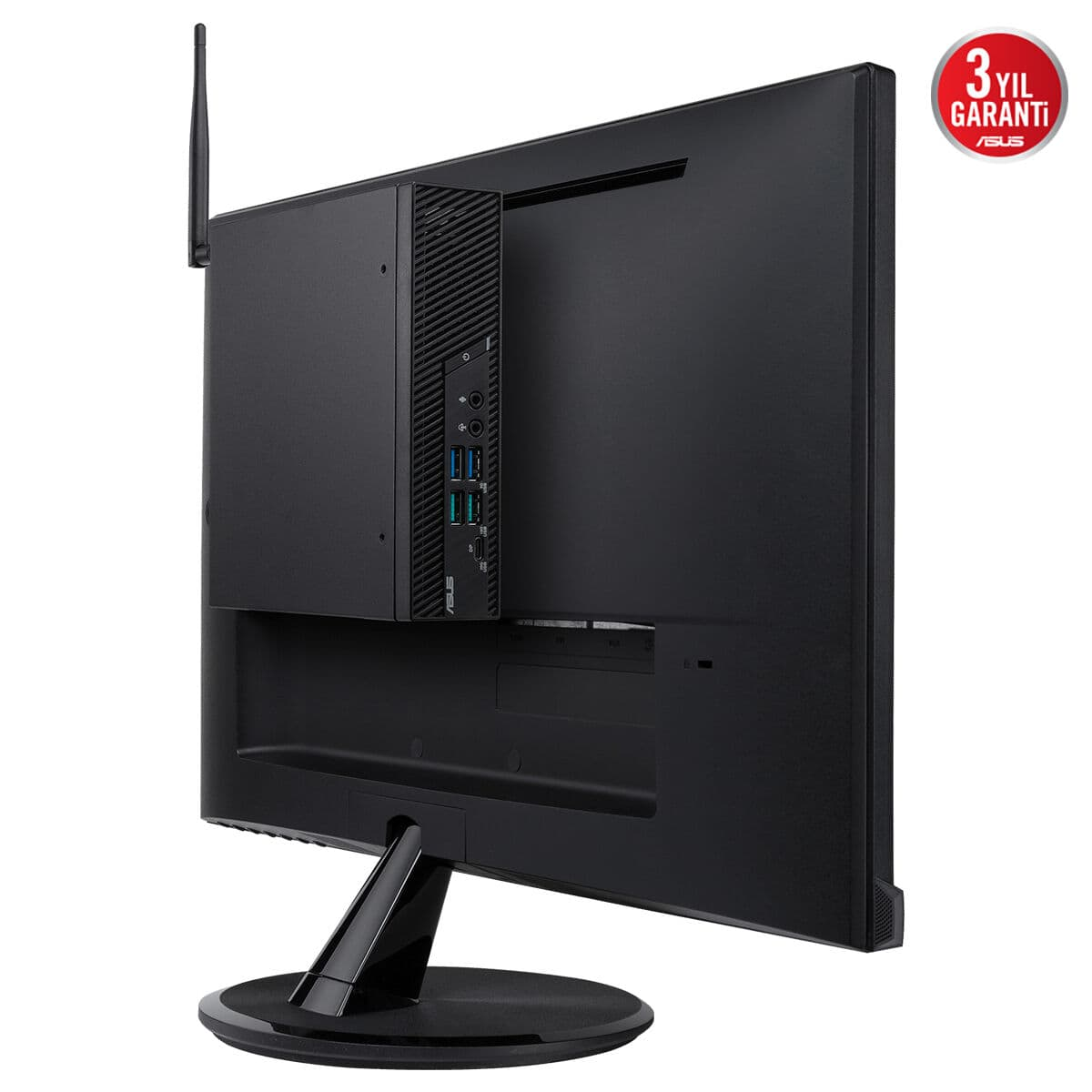 Siyah mini PC, siyah monitörün arkasına takılıdır. Anten dışarıdadır.