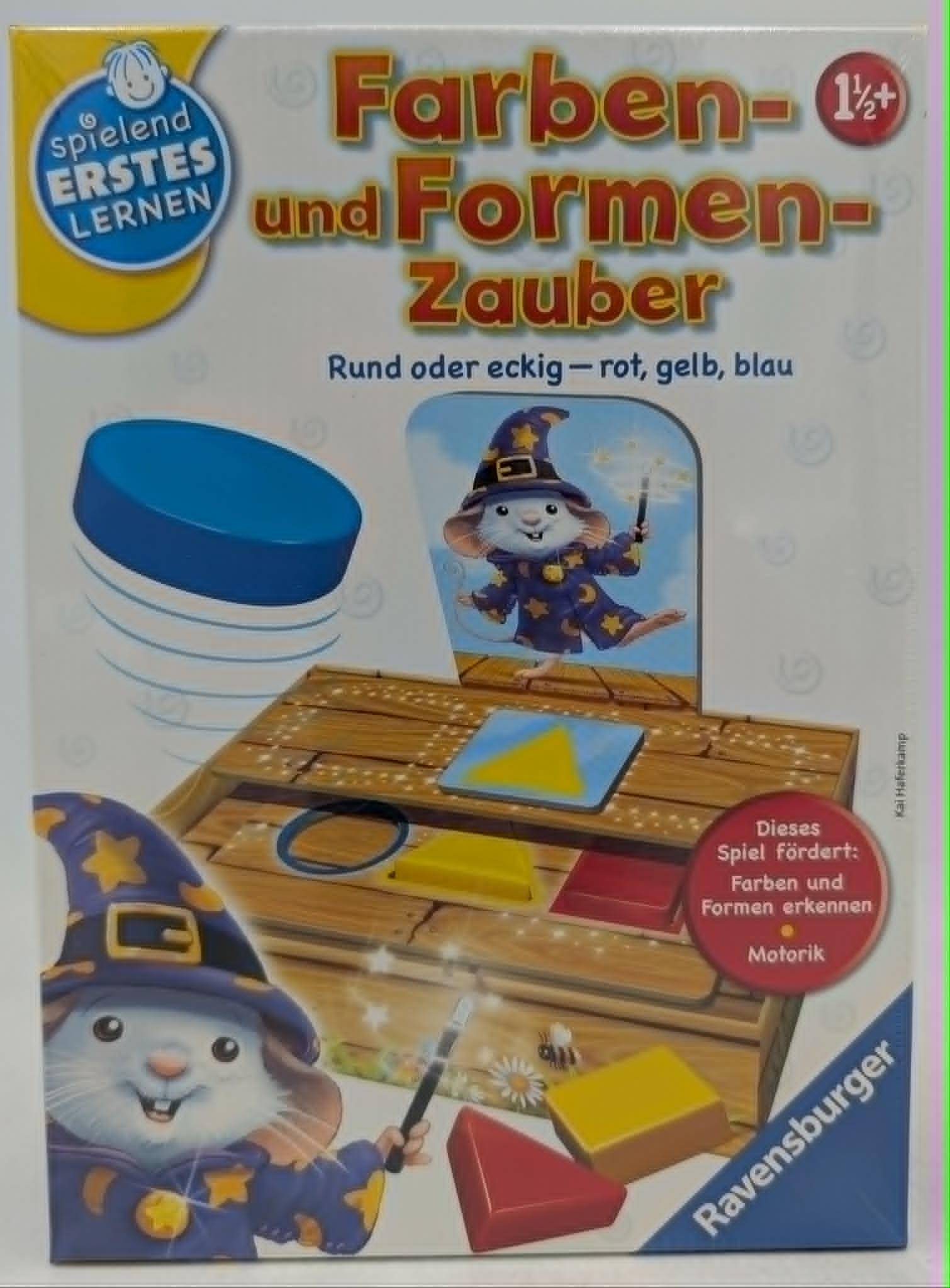 Spielzeugverpackung: Maus verkleidet als Zauberer mit bunten Klötzen.