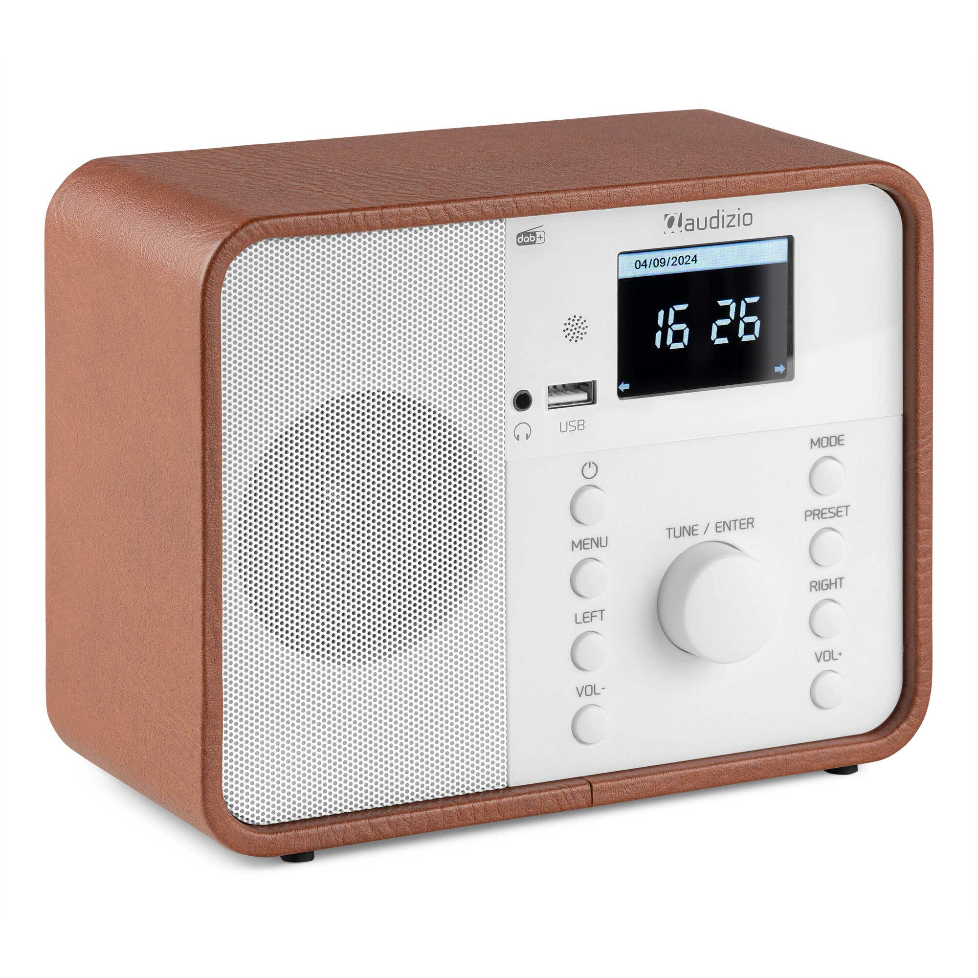 Ein brauner DAB+ Radio mit weißem Lautsprechergitter und einem digitalen Display.
