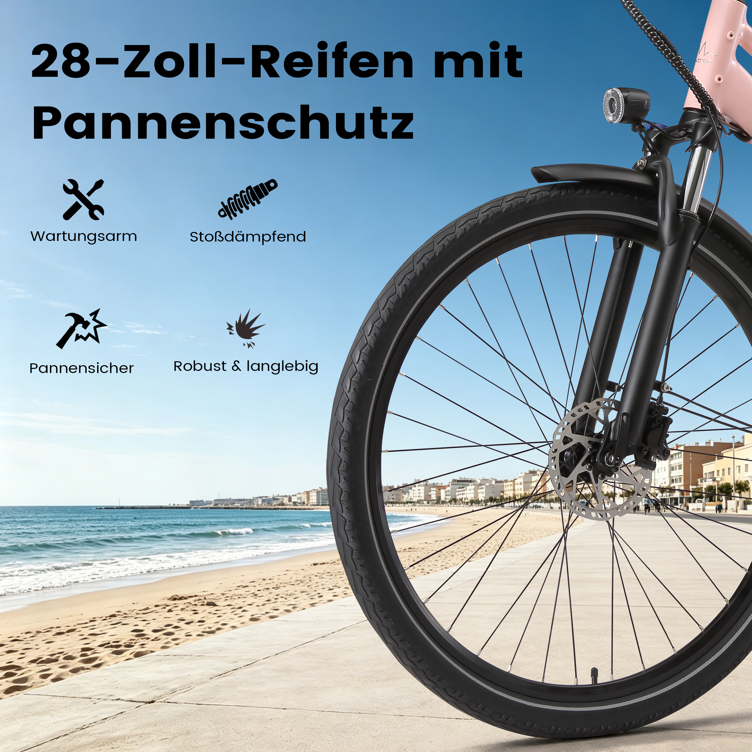 Ein pinkes Fahrrad mit 28-Zoll-Reifen und Pannenschutz am Strand.