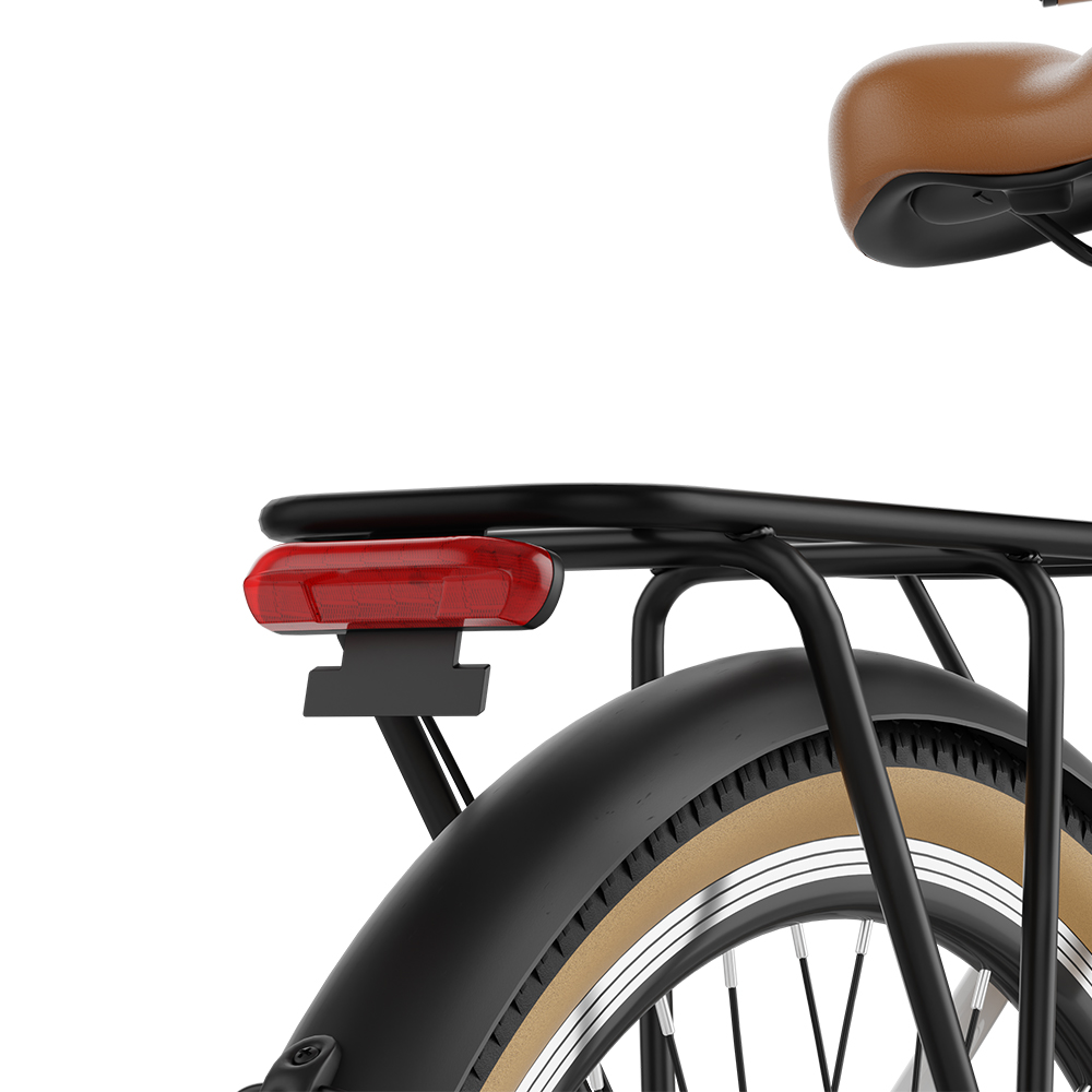 Fanale posteriore di una bicicletta con sella marrone e portapacchi nero.