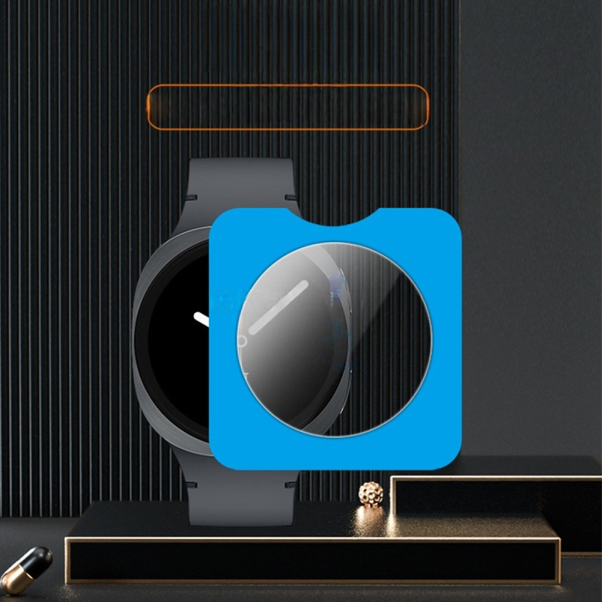 Graue Smartwatch mit blauem Display-Schutz und orangefarbenem Akzent.