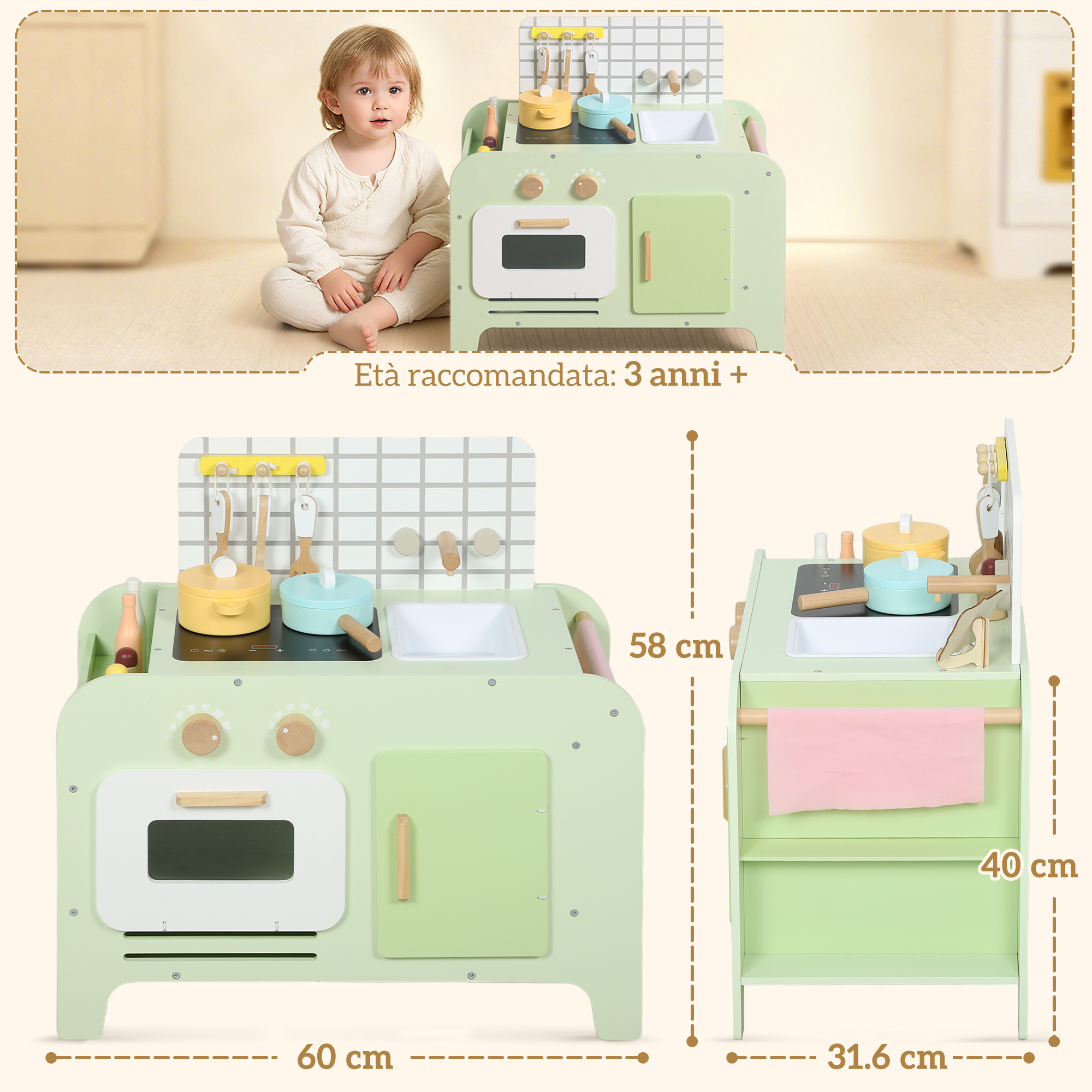 Un bambino piccolo è seduto accanto a una cucina giocattolo verde chiaro con accessori.