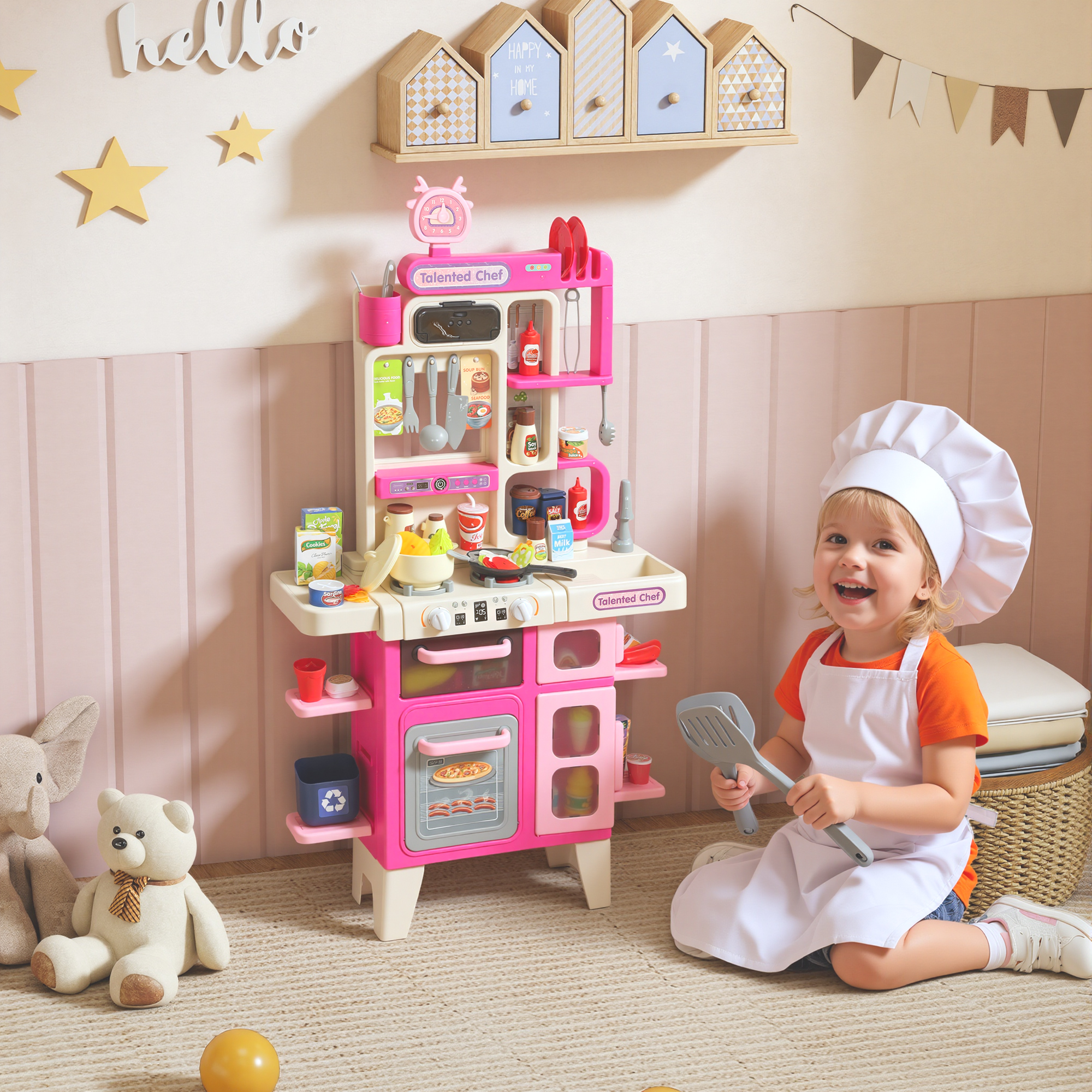 Una bambina in tenuta da chef gioca con una cucina giocattolo rosa.