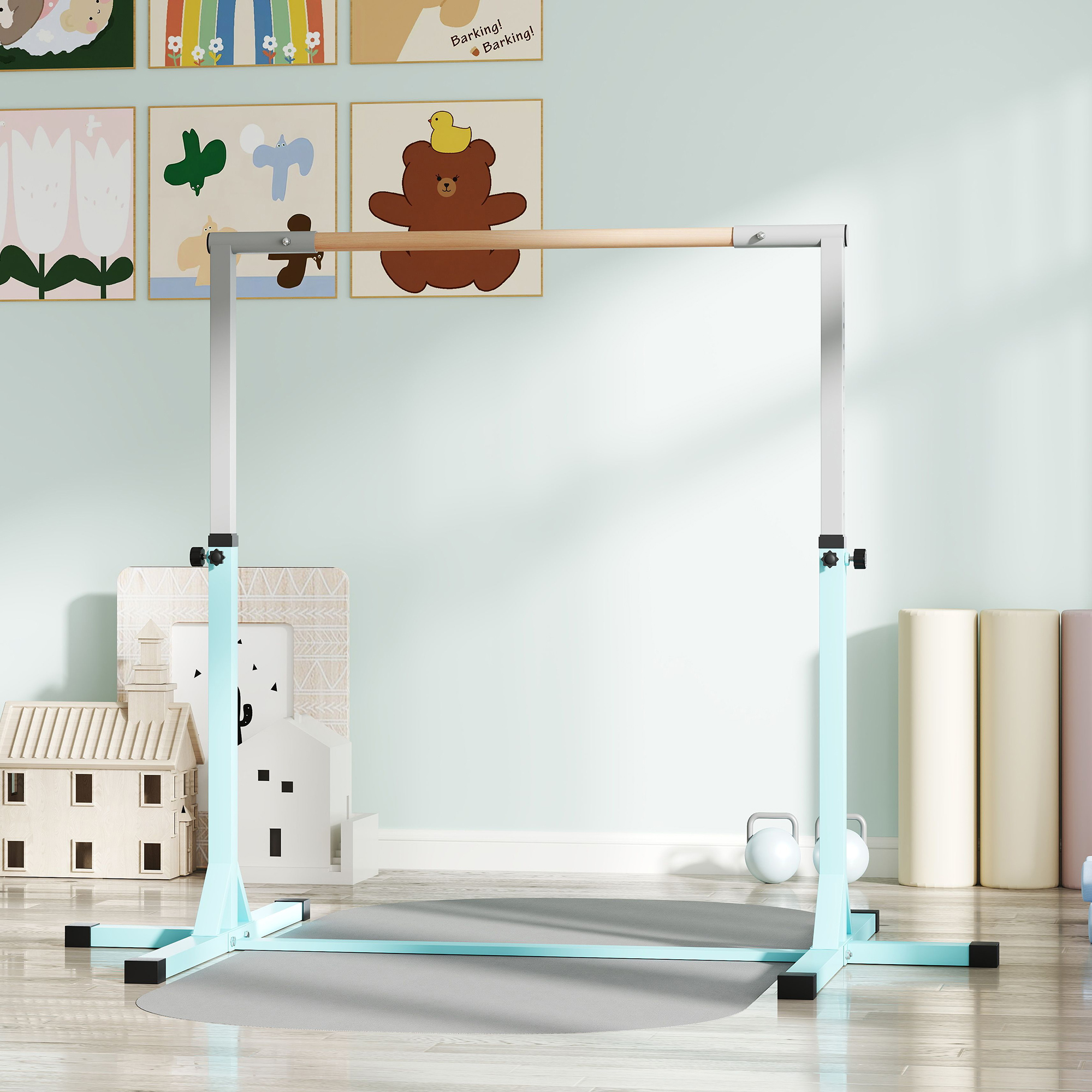Una sbarra da balletto per bambini con barra in legno e gambe azzurro chiaro.