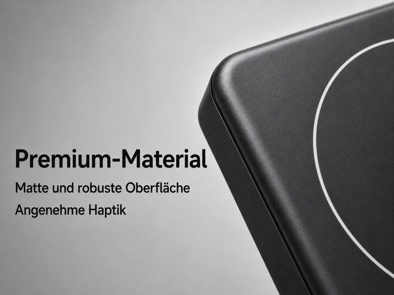 Nahaufnahme einer schwarzen, matten Oberfläche mit weißem Kreisdesign. Text: Premium-Material.