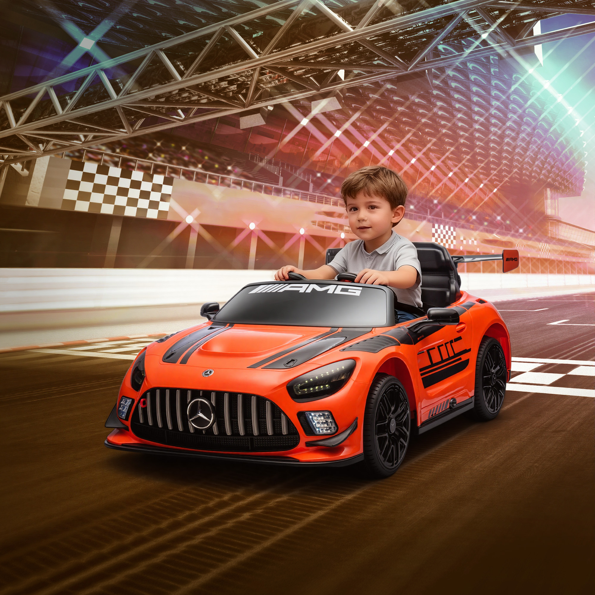 Un bambino su un'auto giocattolo arancione guida su una pista da corsa.