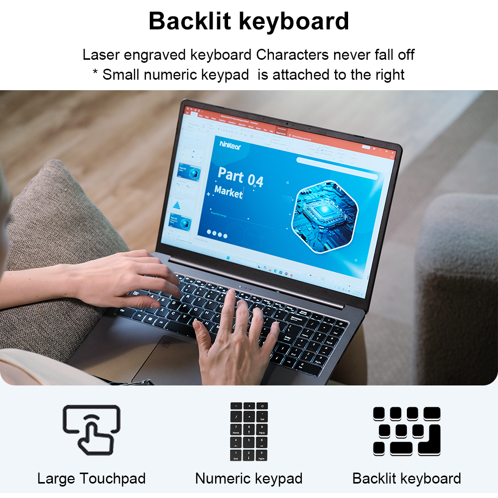 Una persona escribe en un teclado de portátil retroiluminado, con iconos debajo.
