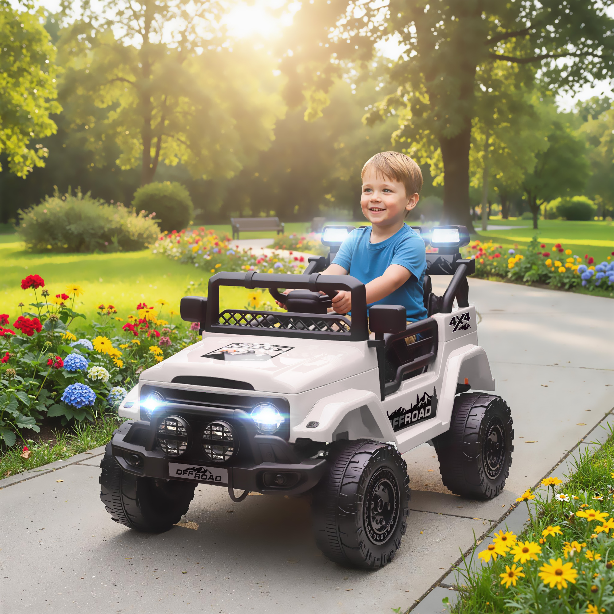Un bambino guida una jeep elettrica bianca in un parco con fiori.
