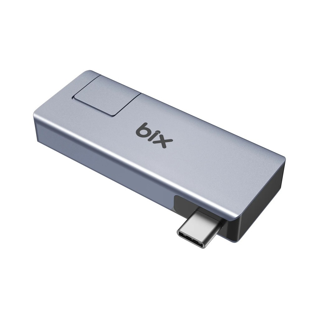 Gümüş renkli "bix" logolu USB-C adaptörü.