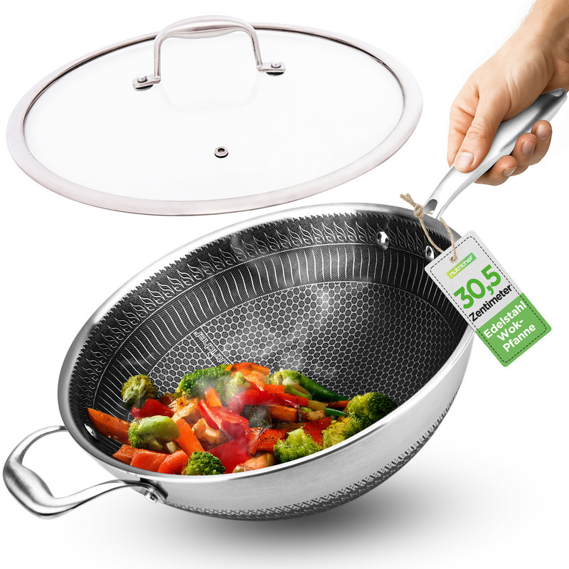 Edelstahl Wokpfanne mit Deckel, gefüllt mit buntem Gemüse wie Brokkoli, Karotten und Paprika.