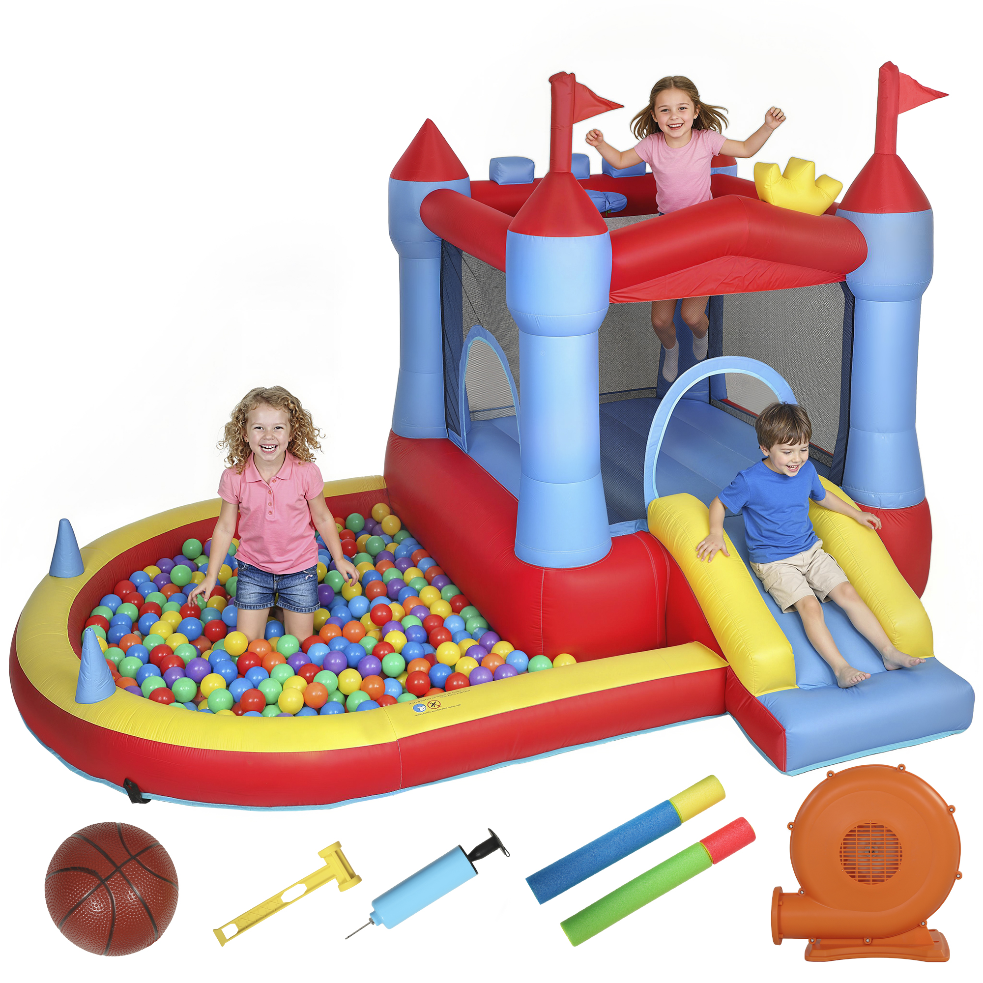 Bambini in un castello gonfiabile rosso e blu con palline, scivolo e accessori.
