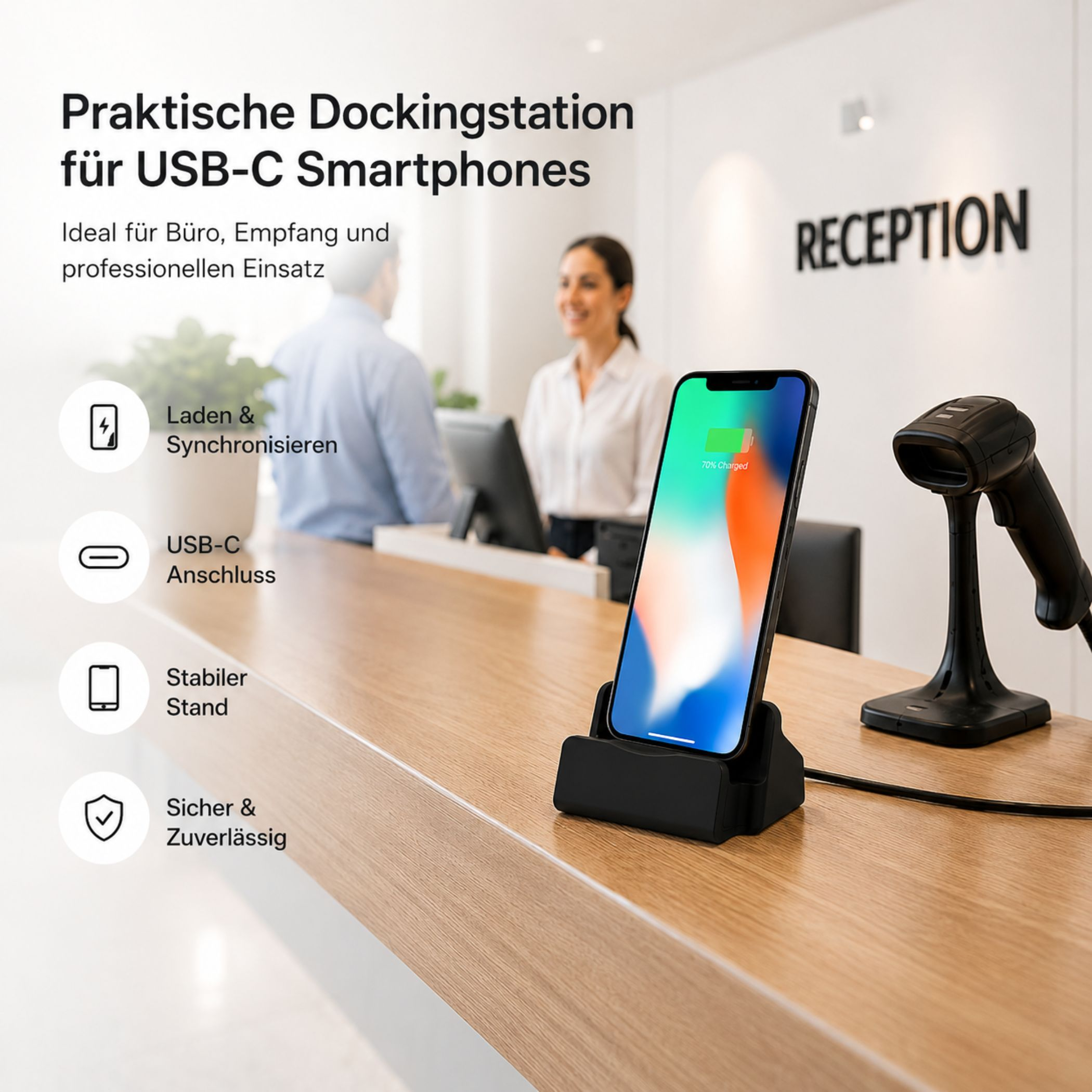 Ein Smartphone in einer Dockingstation am Empfang neben einem Barcode-Scanner.