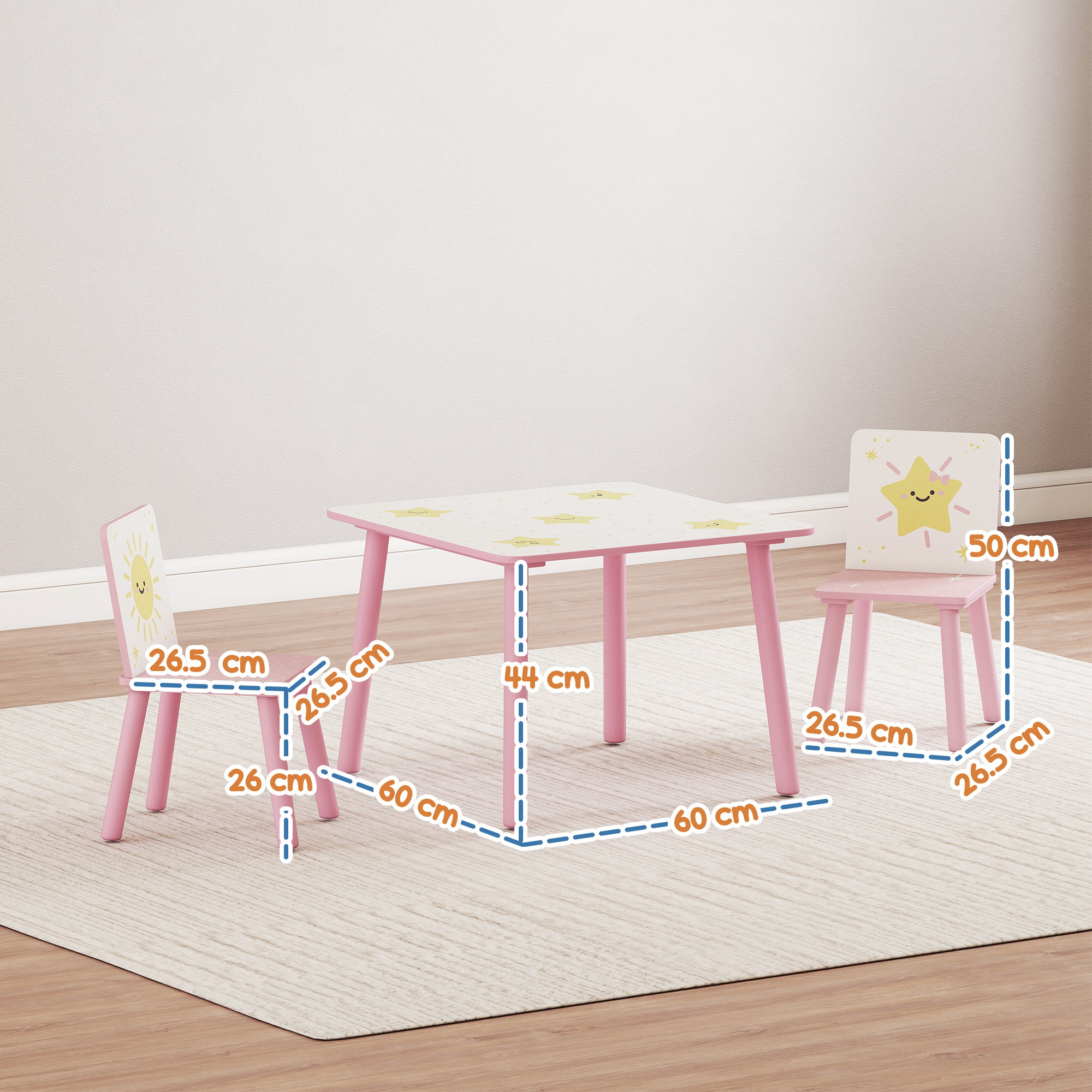 Un tavolo per bambini rosa e due sedie con decorazioni di stelle e soli.