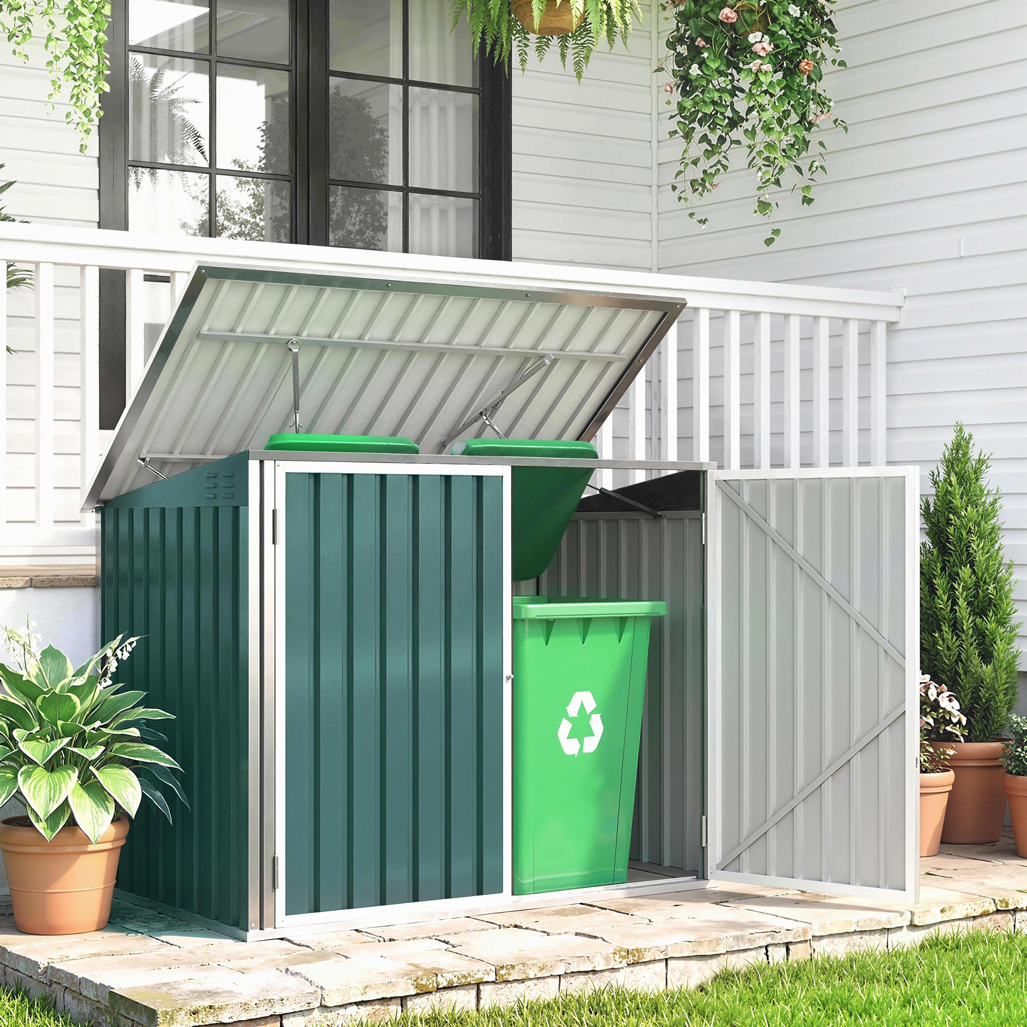 Contenitore per rifiuti verde con coperchio aperto, pianta a lato.