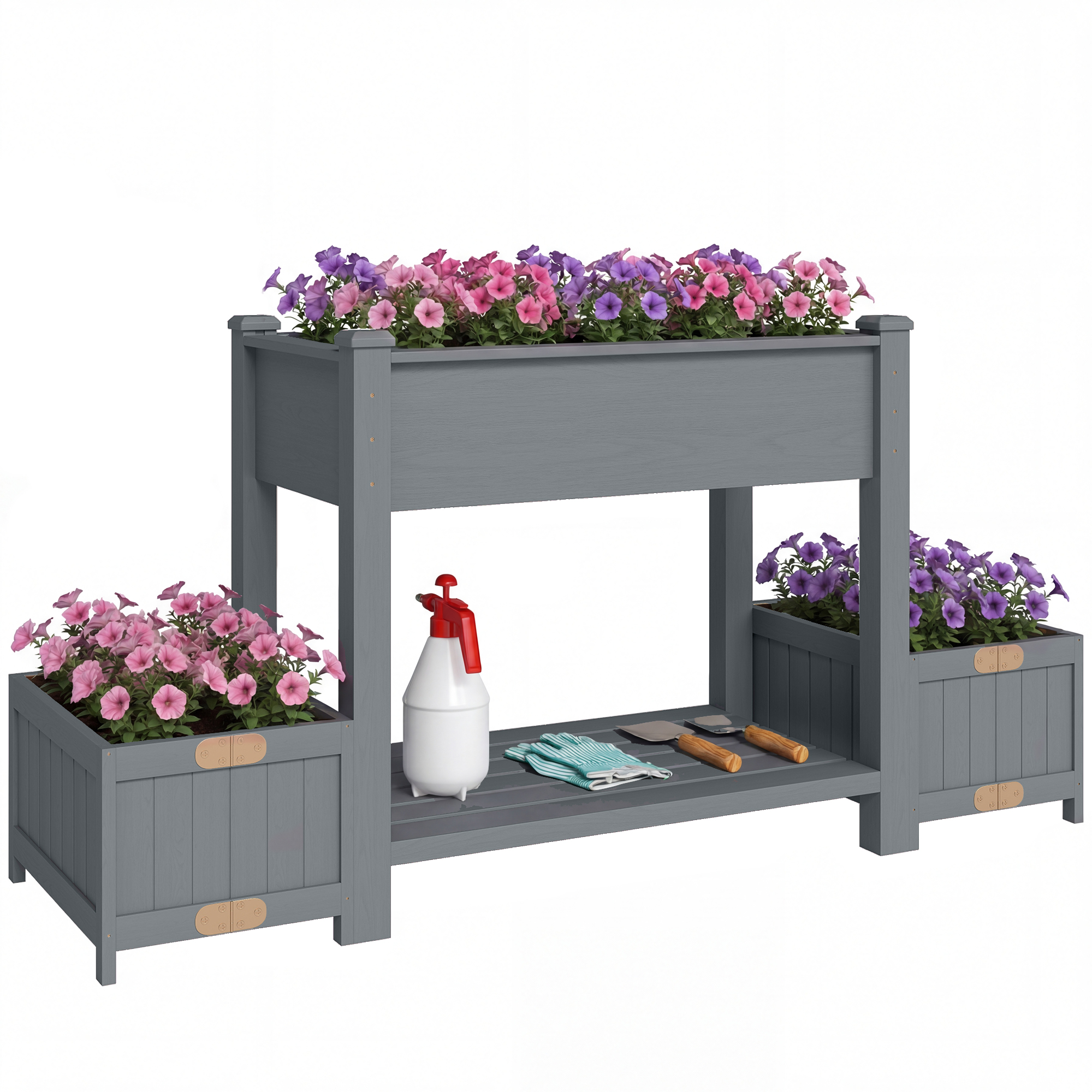 Vaso grigio con fiori rosa e viola, attrezzi da giardino e spruzzino.