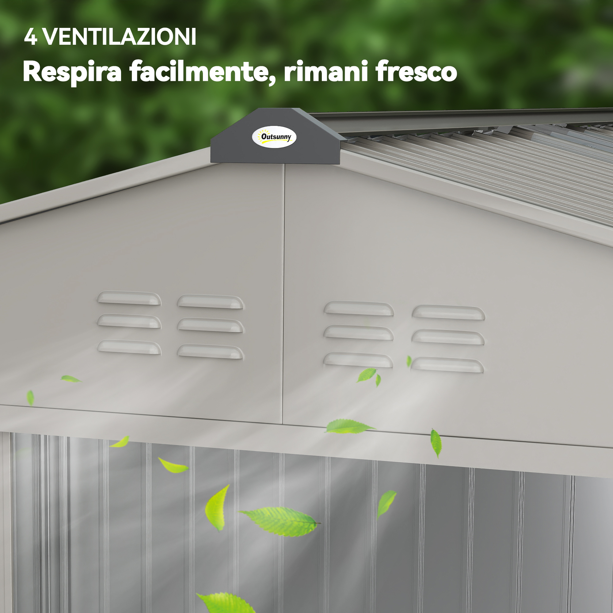 Capanno grigio con fessure di ventilazione e foglie verdi che cadono.