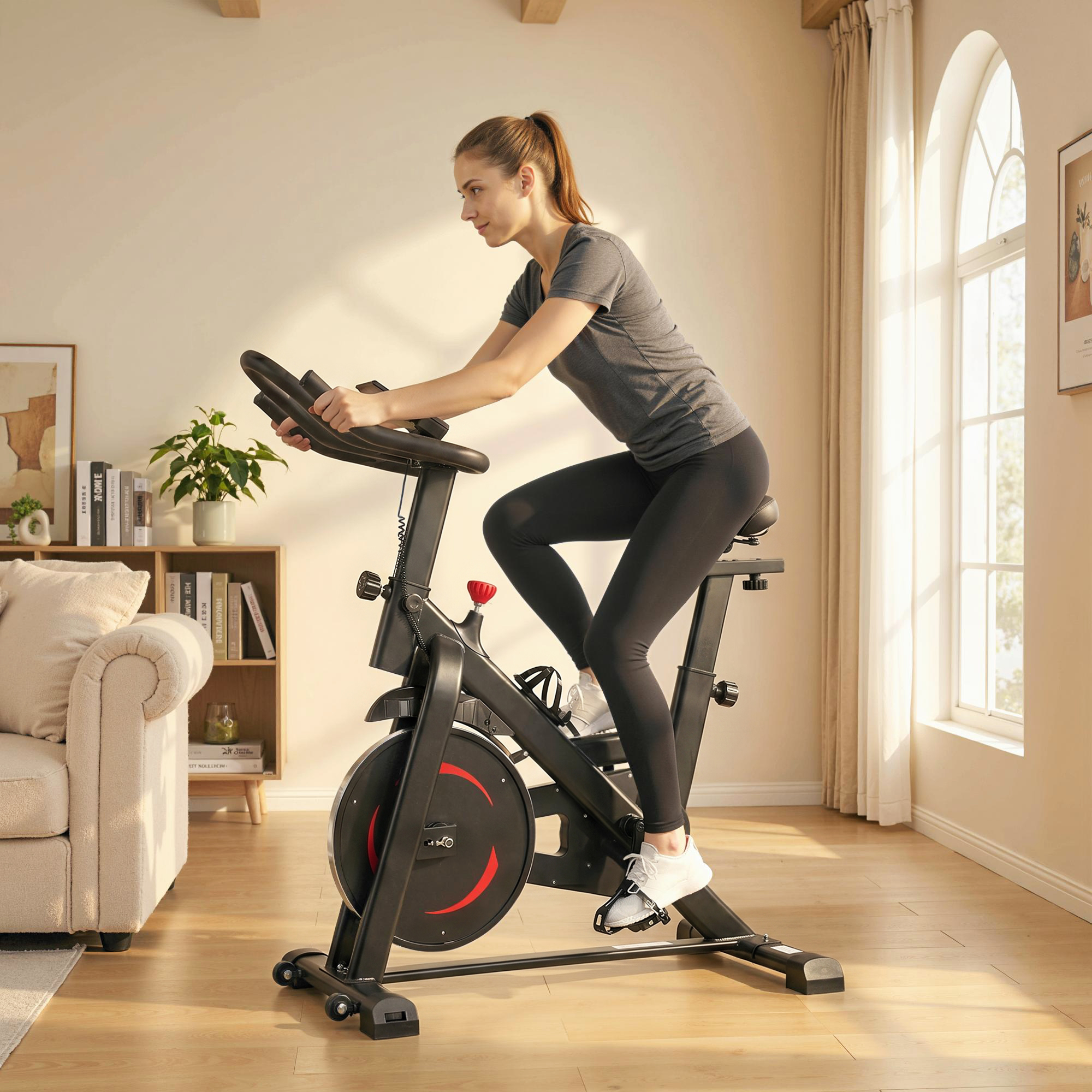 Una donna su una cyclette in una stanza luminosa con divano e libreria.
