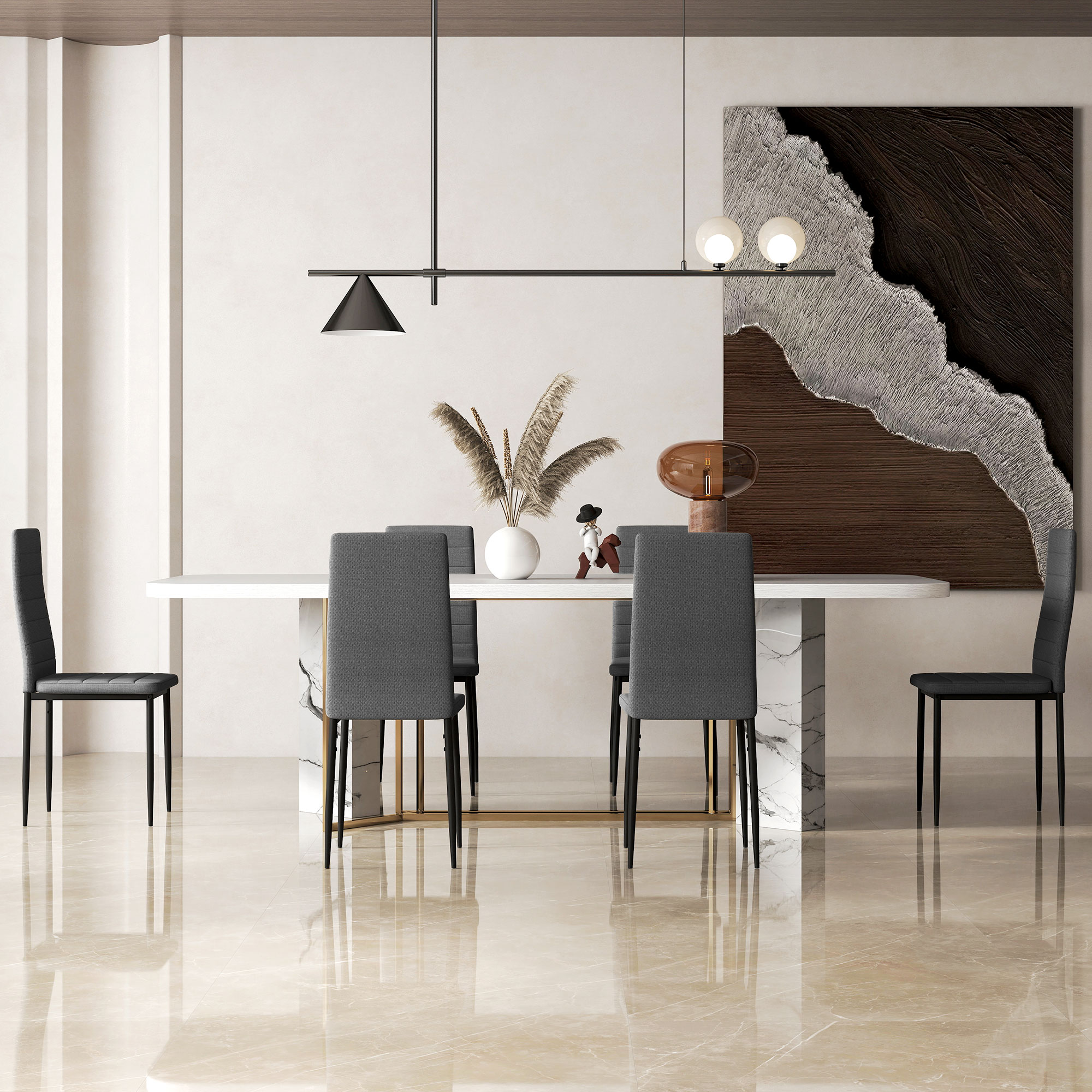 Una zona pranzo moderna con tavolo in marmo, quattro sedie grigie e un'opera d'arte astratta.