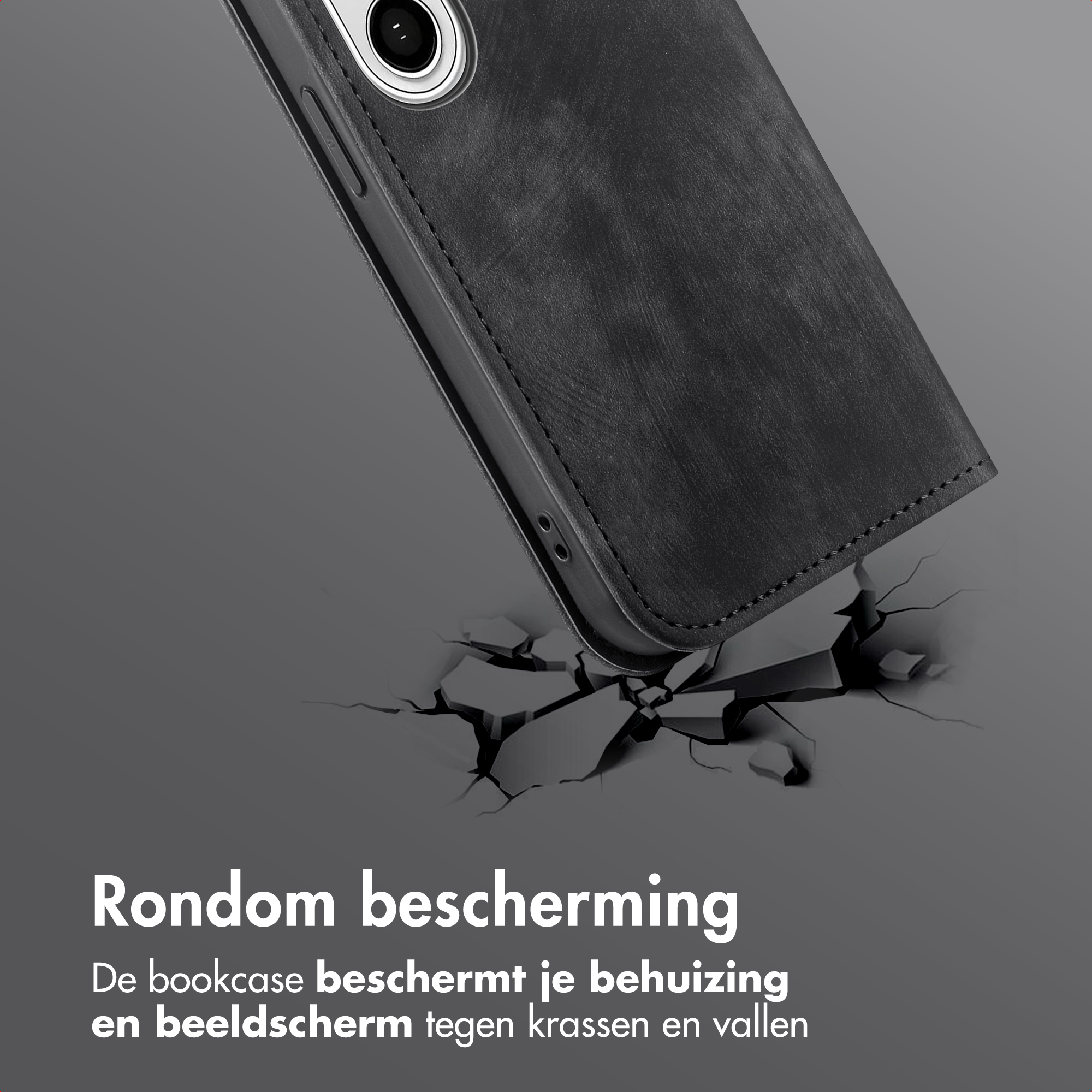 Coque de téléphone noire sur sol craquelé, suggérant une protection contre les chutes.