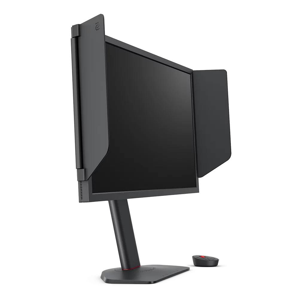 Un monitor nero con paraluce e un piccolo accessorio nero su sfondo bianco.