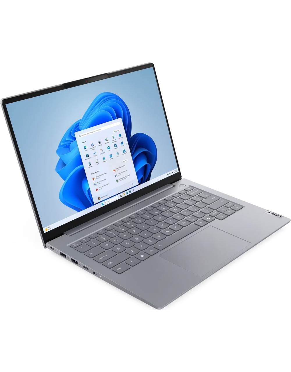 Windows 11 gösteren açık ekranlı gümüş rengi bir dizüstü bilgisayar.