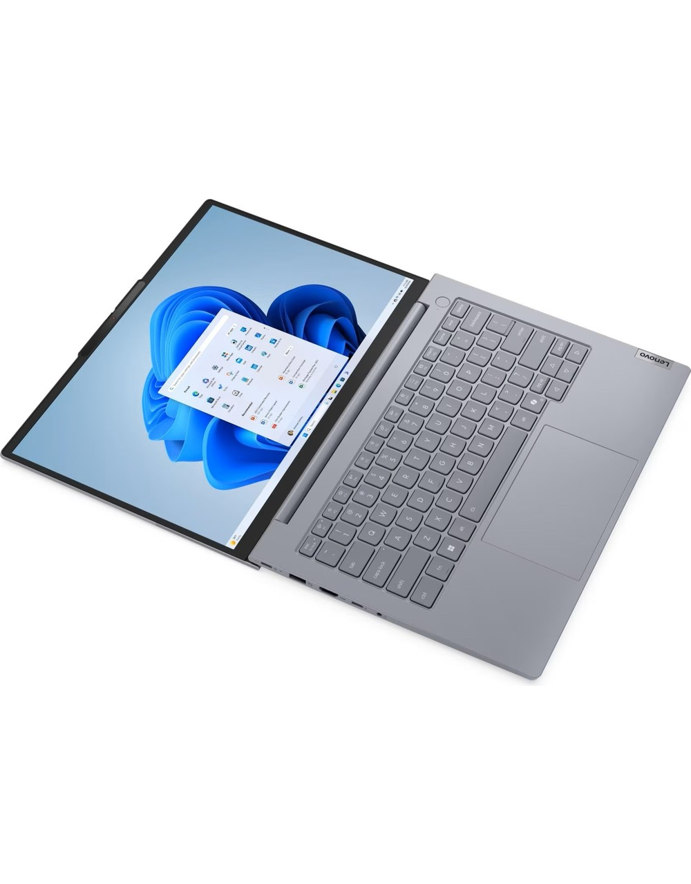 Ekranında Windows simgeleri bulunan açık gri bir Lenovo dizüstü bilgisayar.