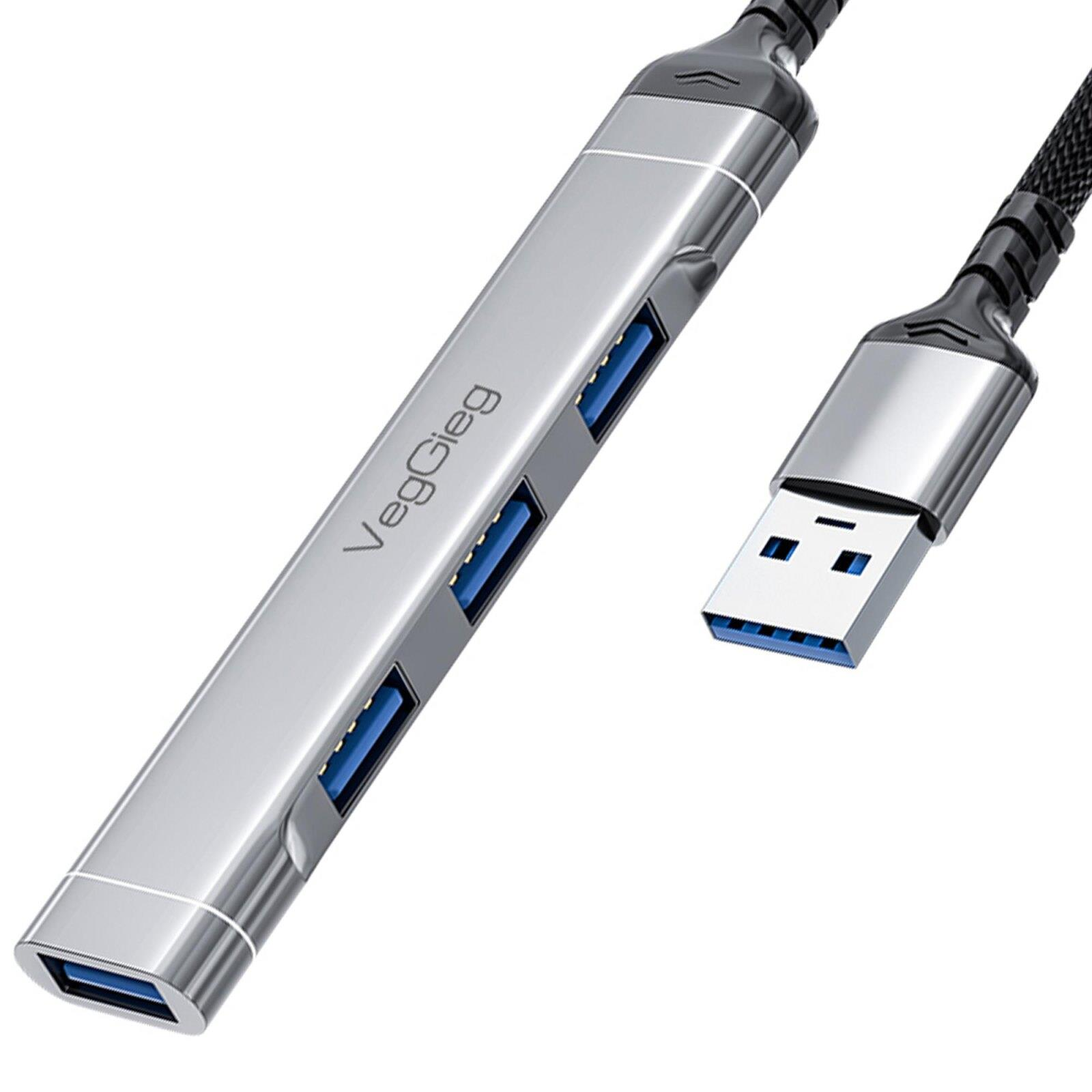 Dört mavi USB 3.0 bağlantı noktasına ve bir USB konektörüne sahip gümüş USB hub.