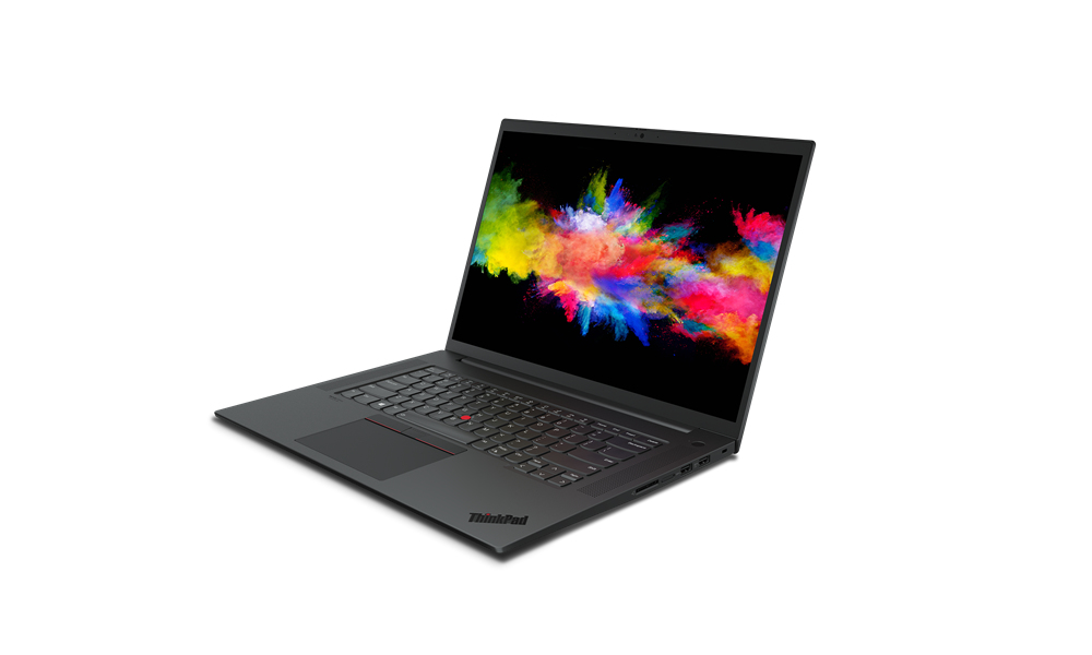 A black laptop displaying a colorful powder explosion on its screen.
