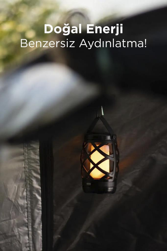 Alev ışıklı bir fener karanlık bir çadırın içinde asılı.