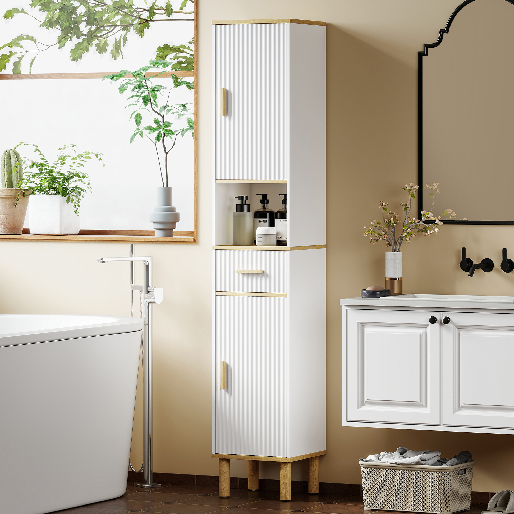 Un bagno moderno con vasca bianca, mobile alto bianco e mobiletto con specchio.