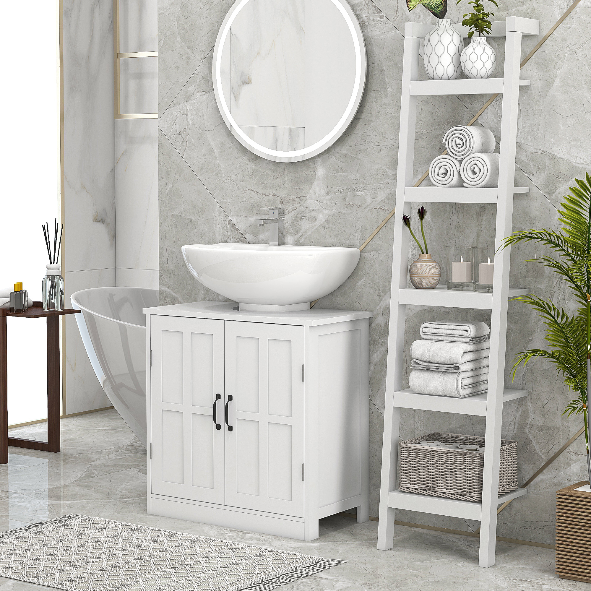 Bagno con mobile lavabo bianco, vasca freestanding e scaffale a scala con asciugamani.