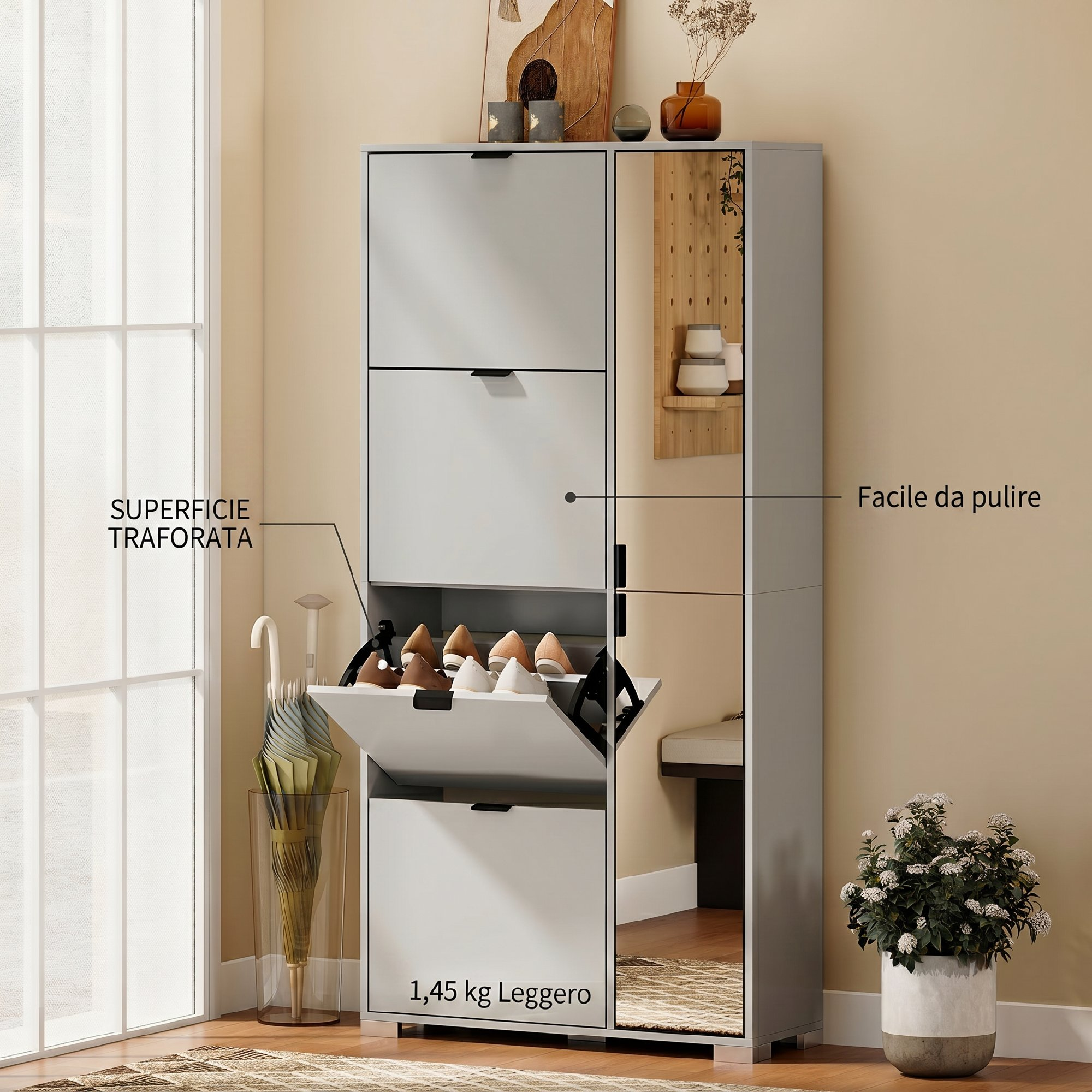 Un mobiletto portascale bianco con specchio, pieno di scarpe e ombrello.