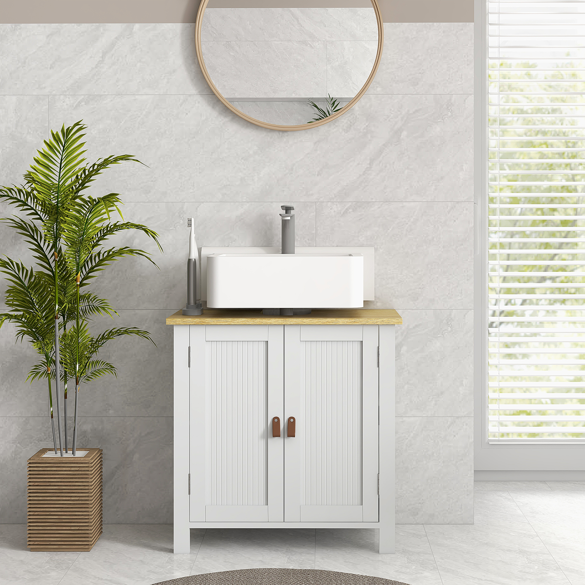 Un mobile da bagno con lavandino, specchio e pianta.