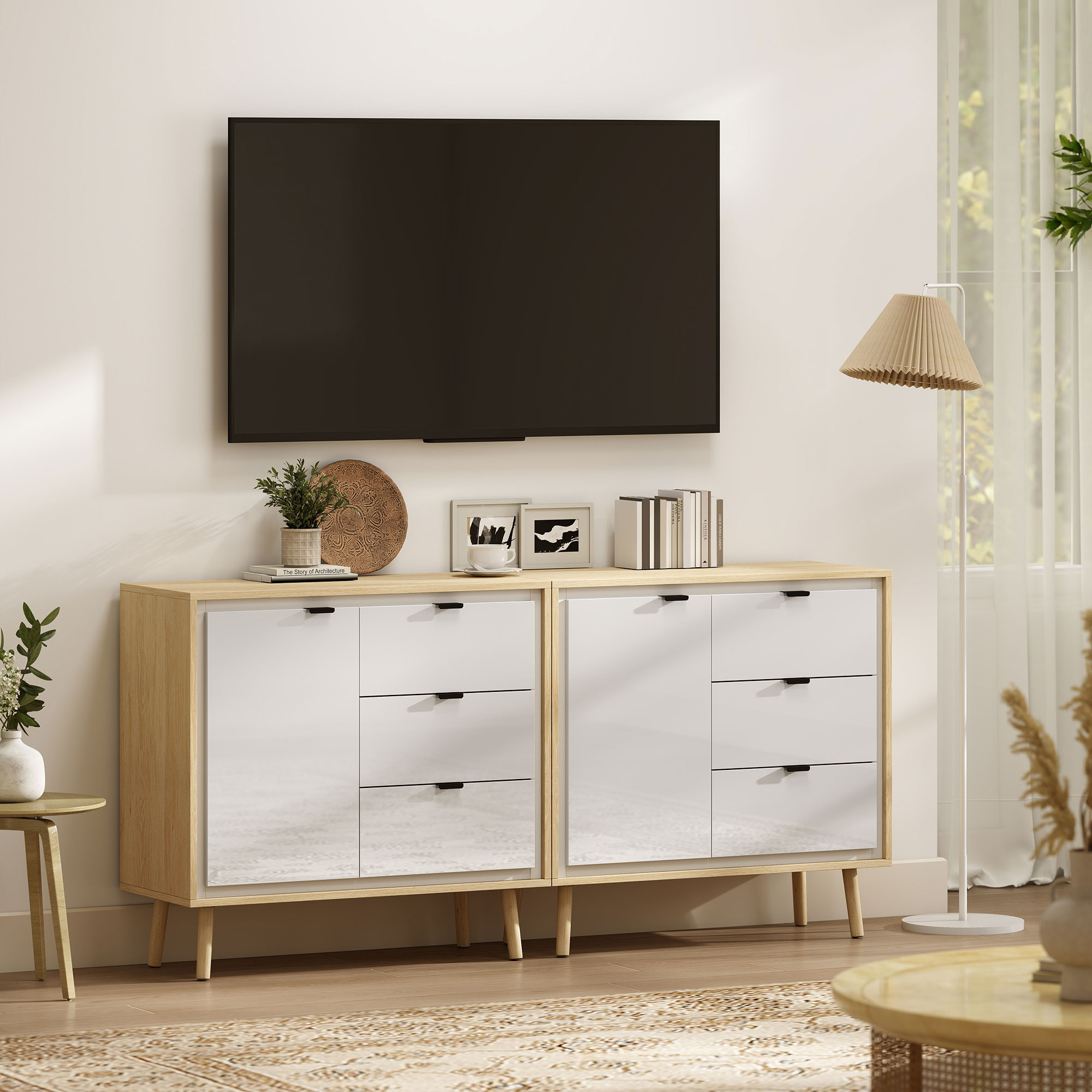 Un mobile moderno da soggiorno con cassetti bianchi e accenti in legno.