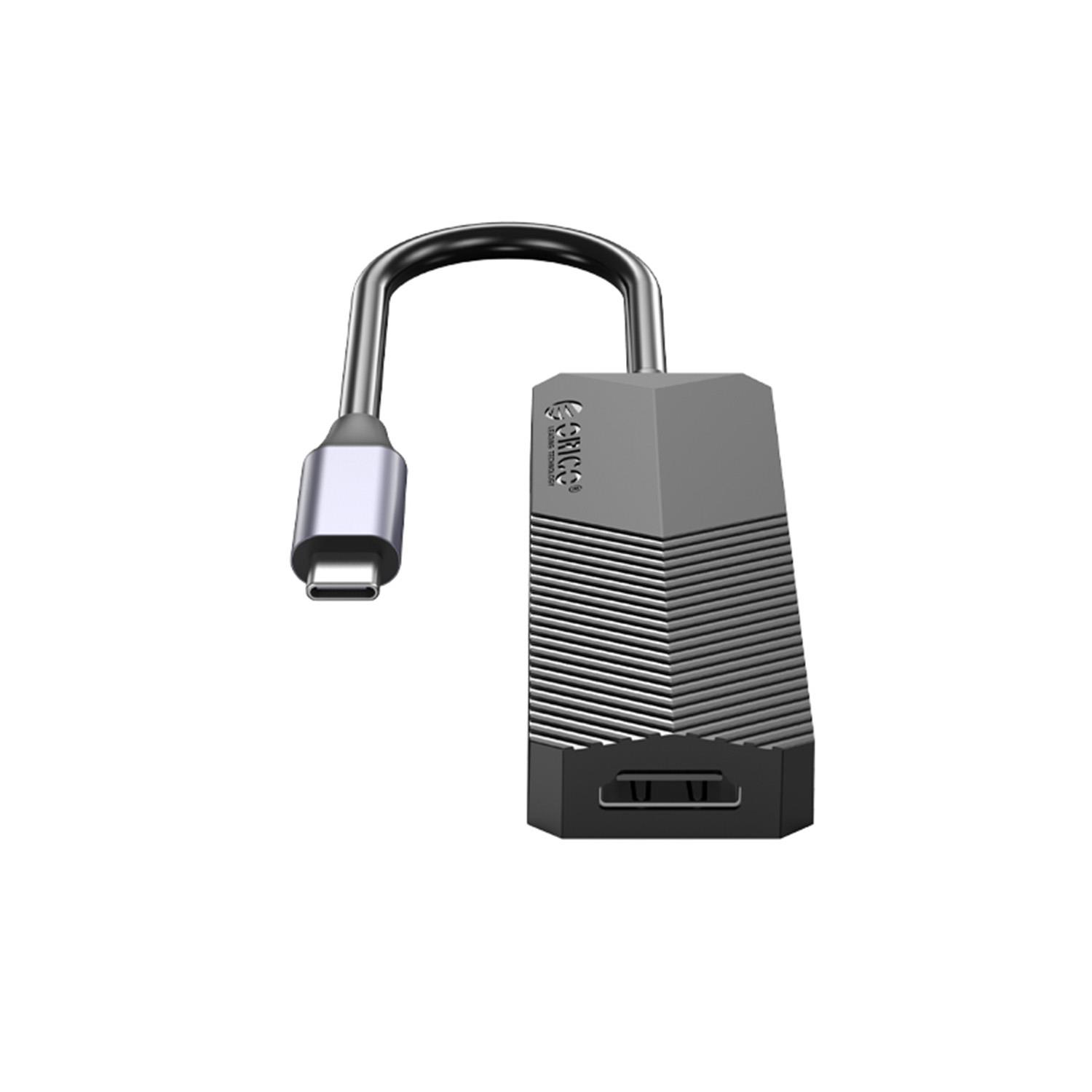 Tek HDMI bağlantı noktalı, yivli dokulu gri USB-C adaptörü.