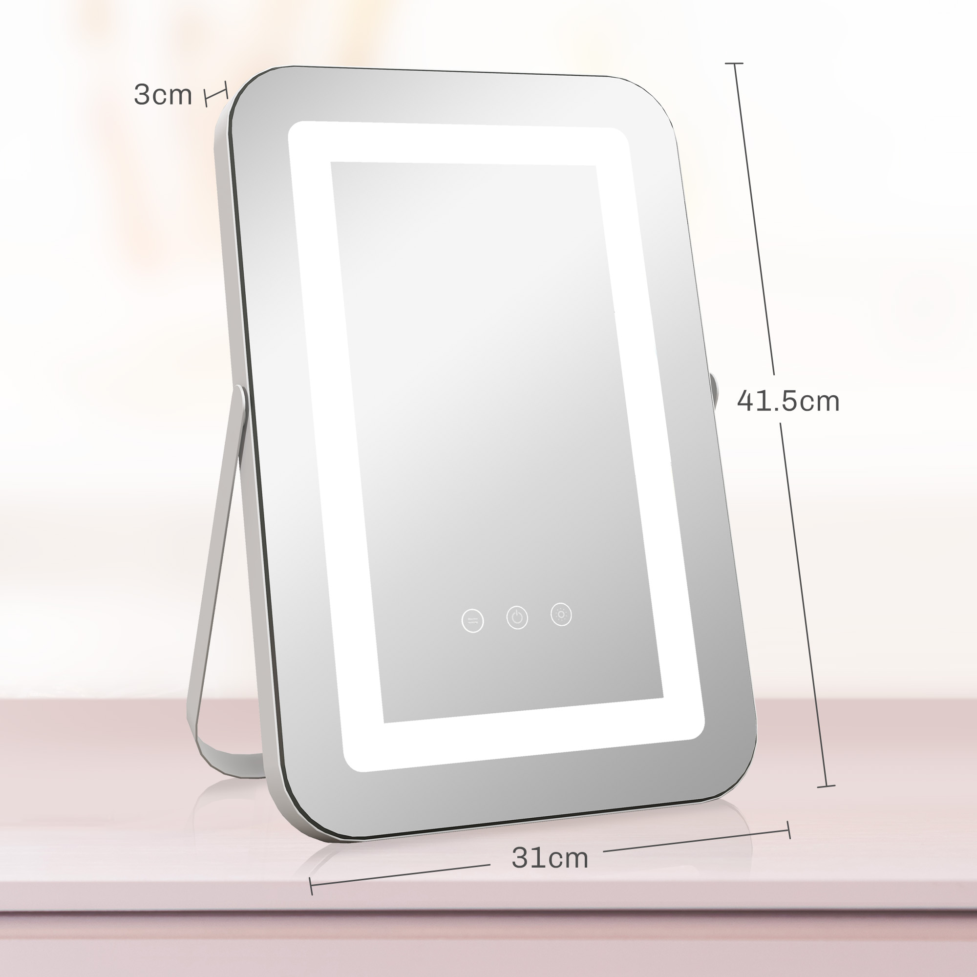 Uno specchio per trucco argentato con luci LED, largo 31cm, alto 41.5cm, profondo 3cm.