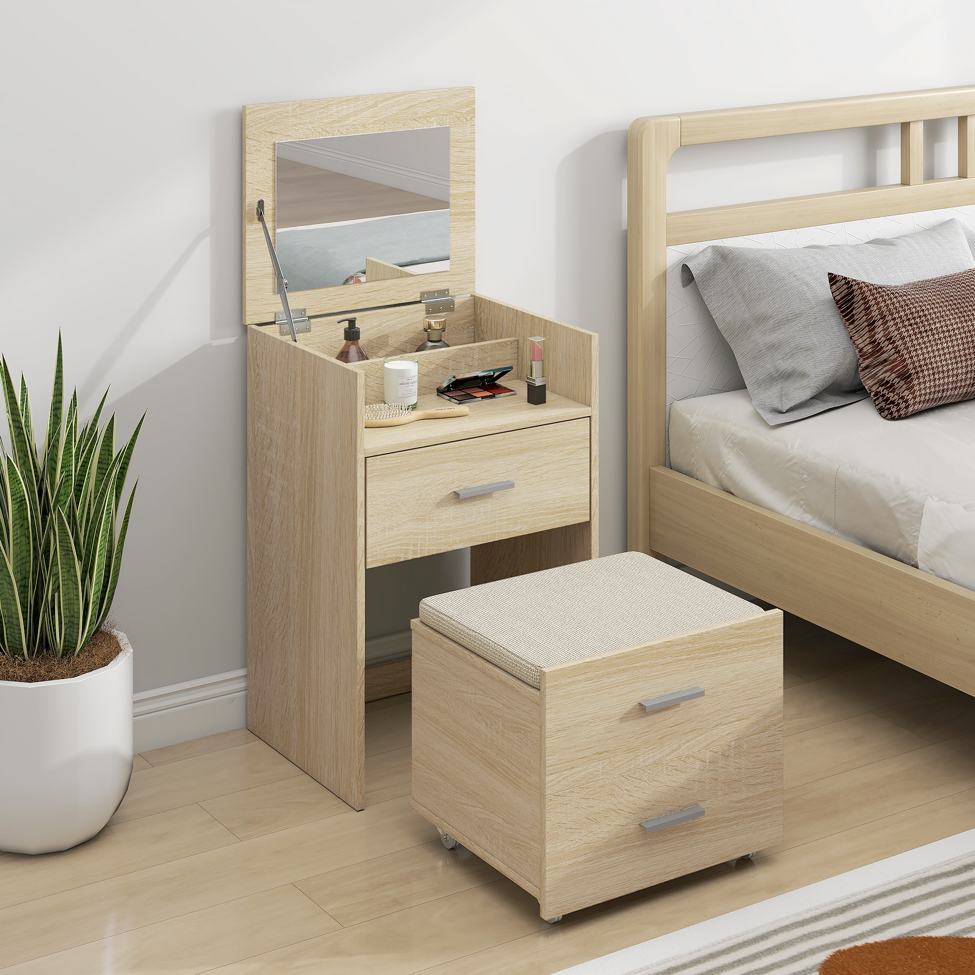 Una toeletta in legno con specchio, sgabello e letto in una camera da letto.
