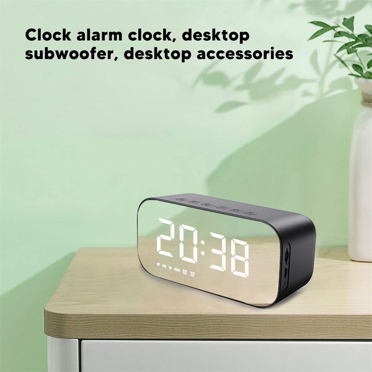 Schwarzer digitaler Wecker mit Spiegeldisplay, zeigt 20:38 an.
